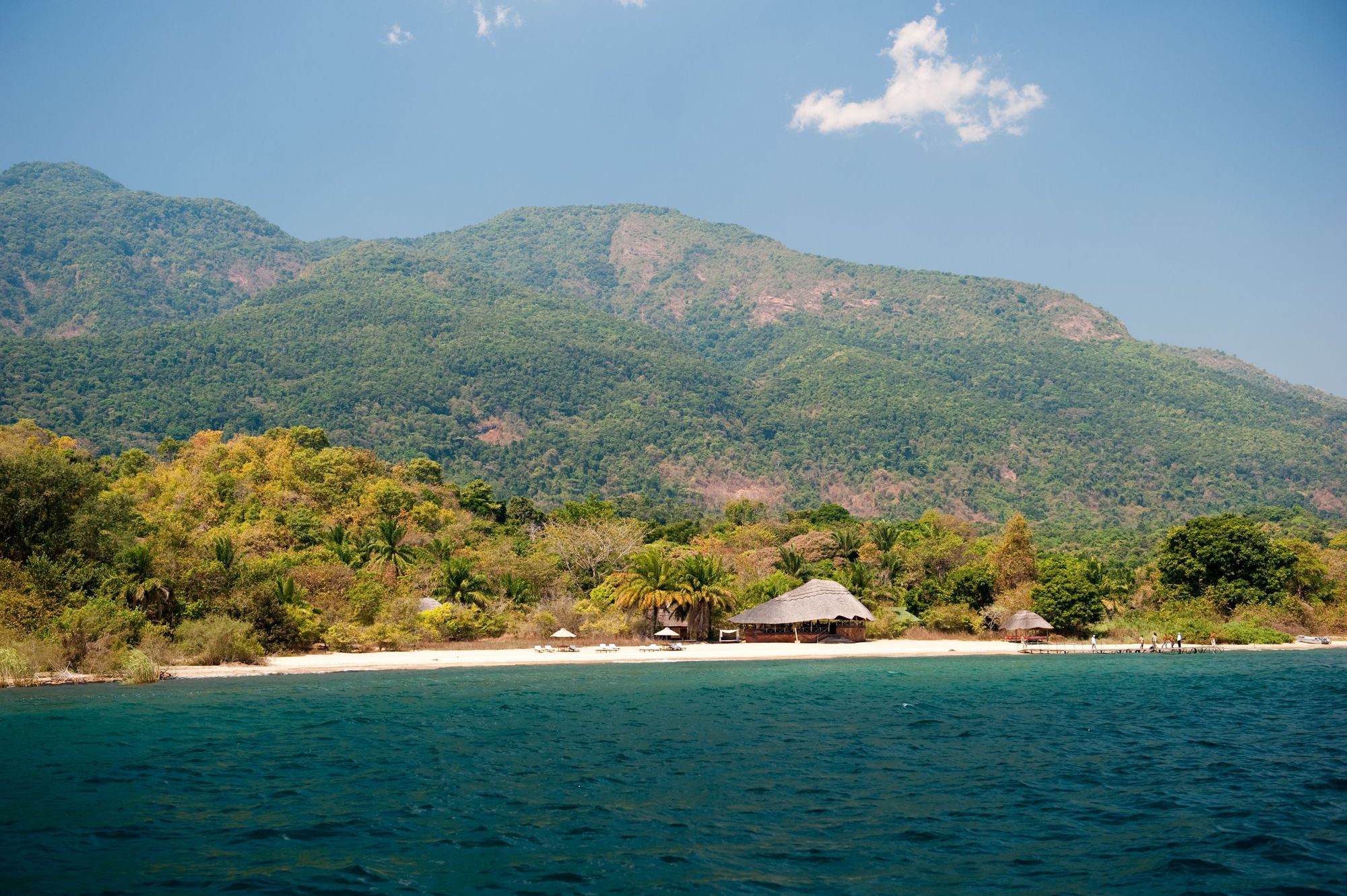 A beach resort looking out on the waters on the edge of the Mahale Mountains. Photo: getty
