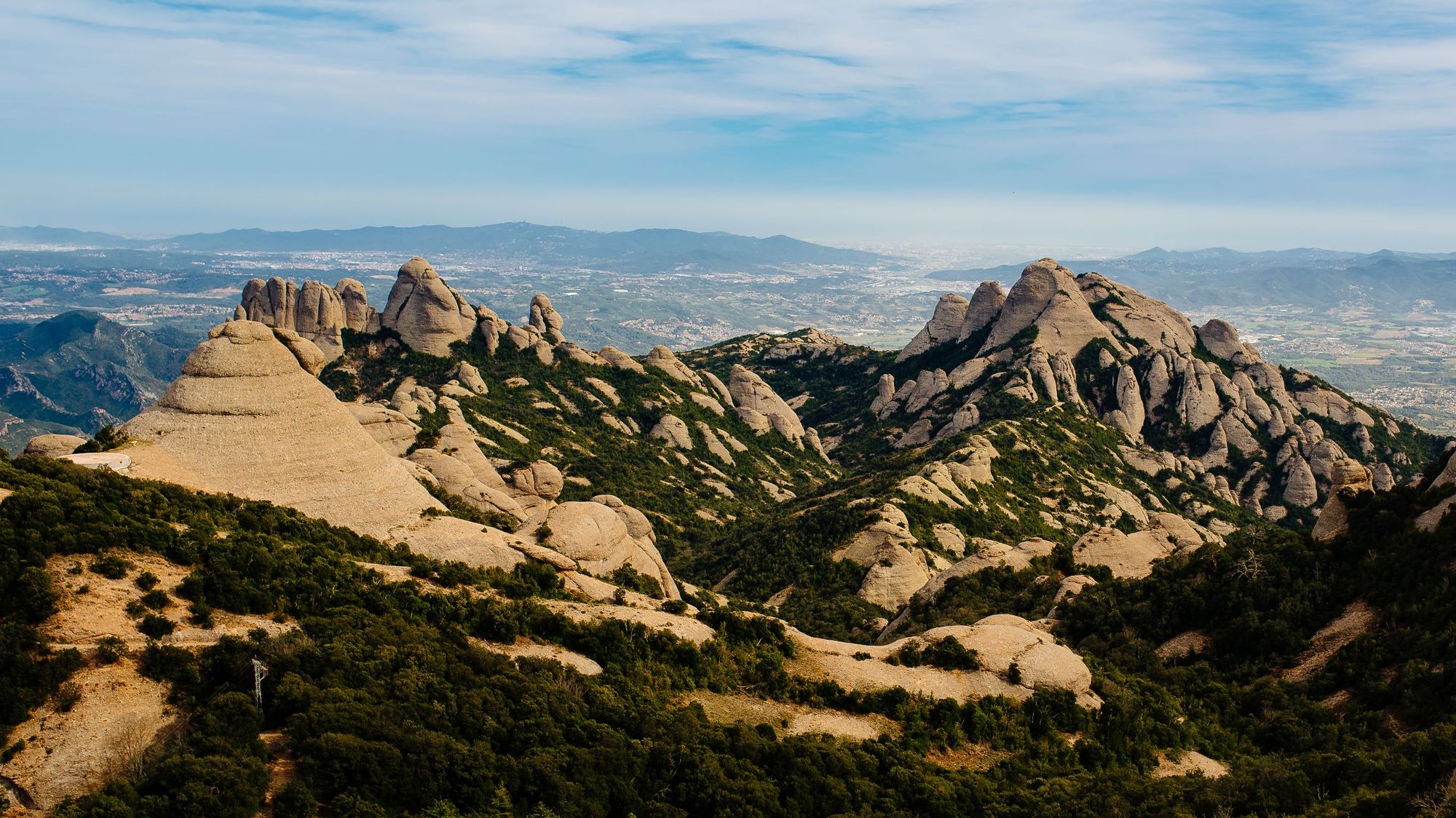 The famous, oddly-shaped rocks of Montserrat, viewed from Sant Jeroni, at 1,236m. Photo: Getty