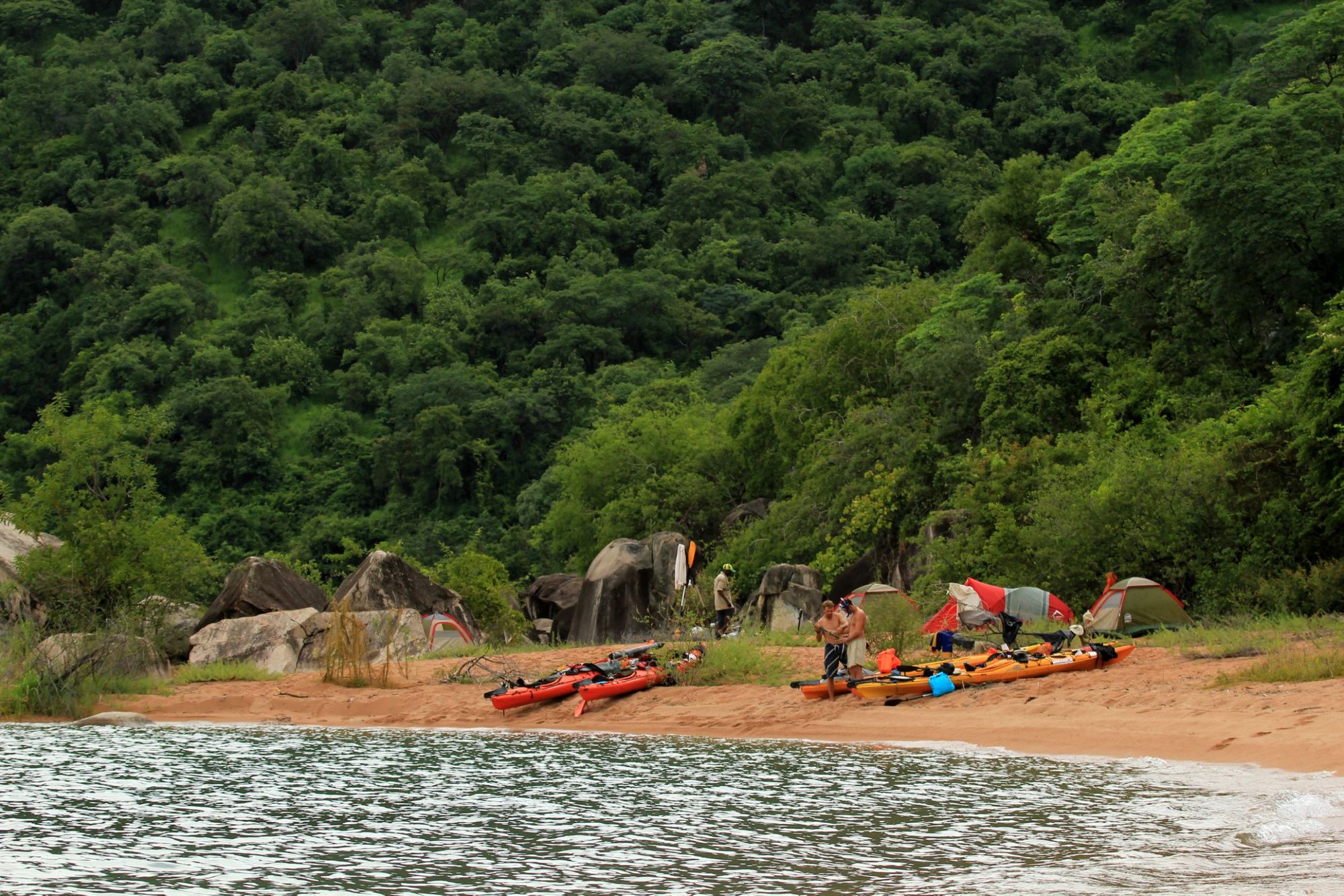 A group of kayakers arrive in Mahale Mountains National Park, on the edge of Lake Tanganyika. Photo: Much Better Adventures