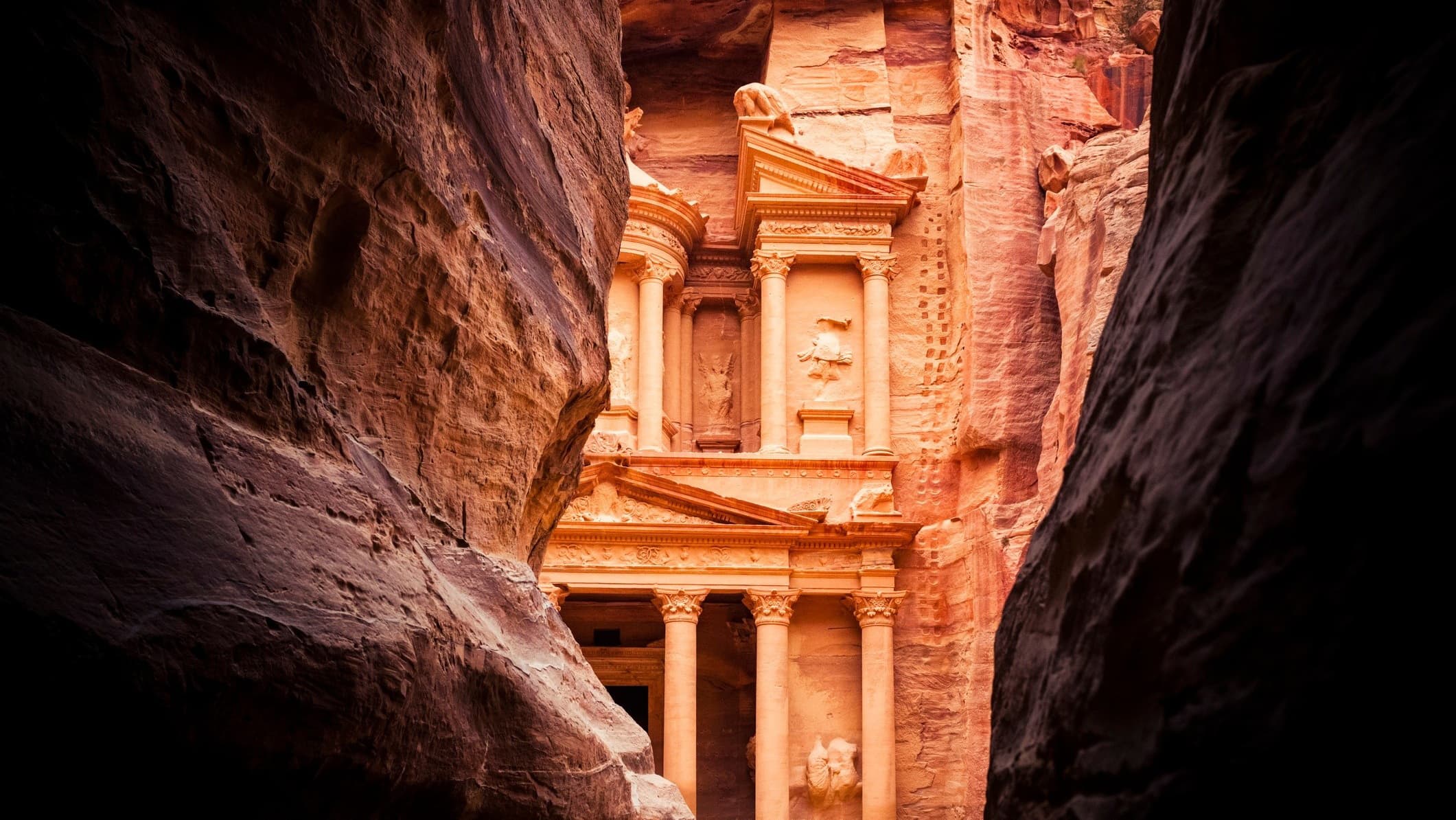 The rose-tinted treasury gates of Petra, an ancient city in Jordan. Photo: Getty