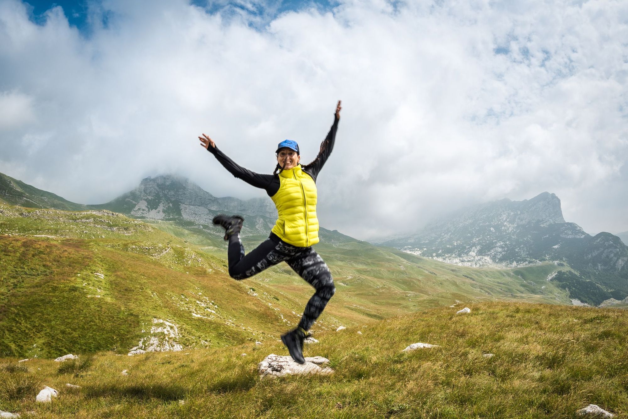 A woman poses in Durmitor National Park, Montenegro