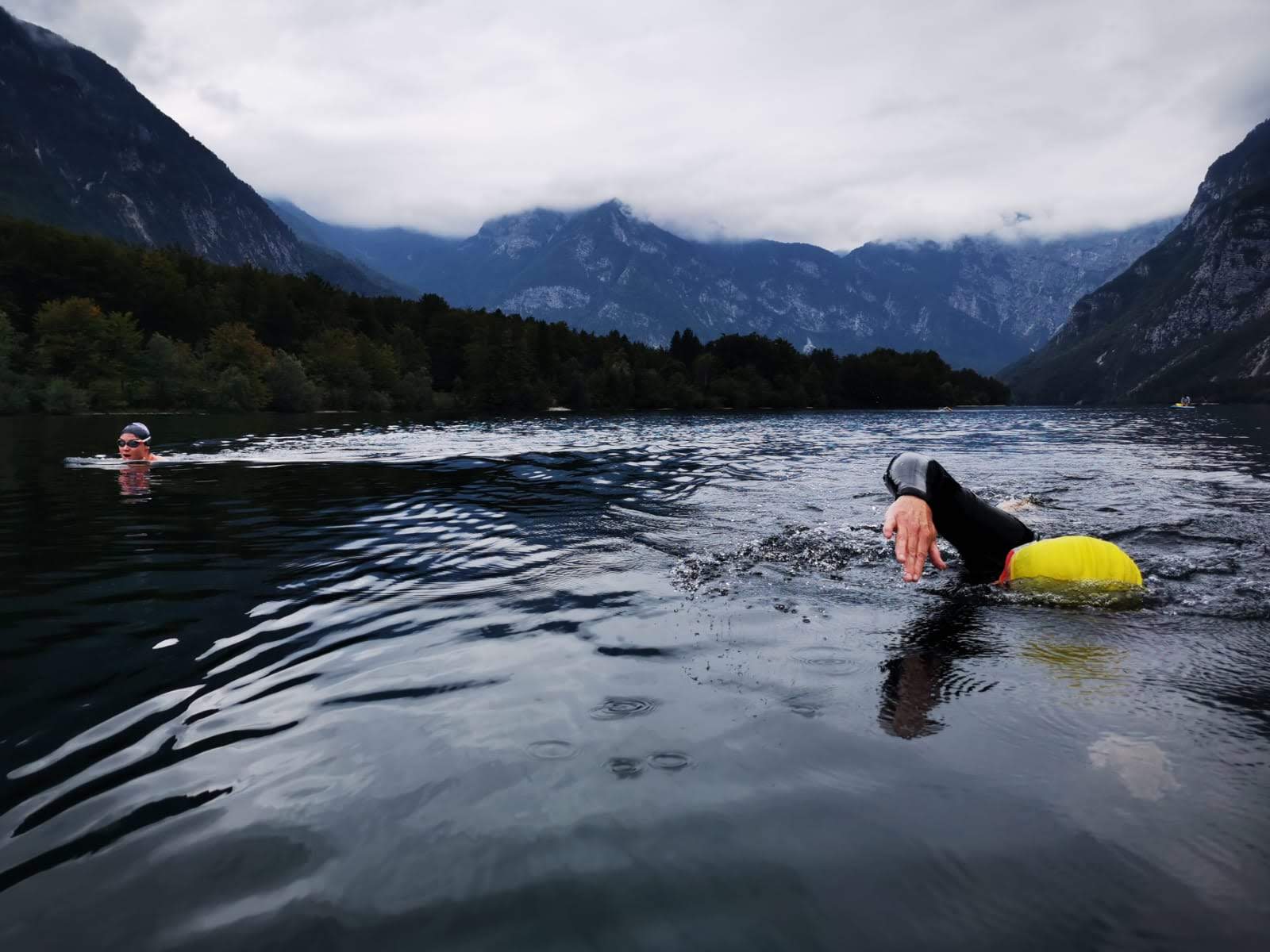 Two swimmers in Lake Bohinj, Slovenia.