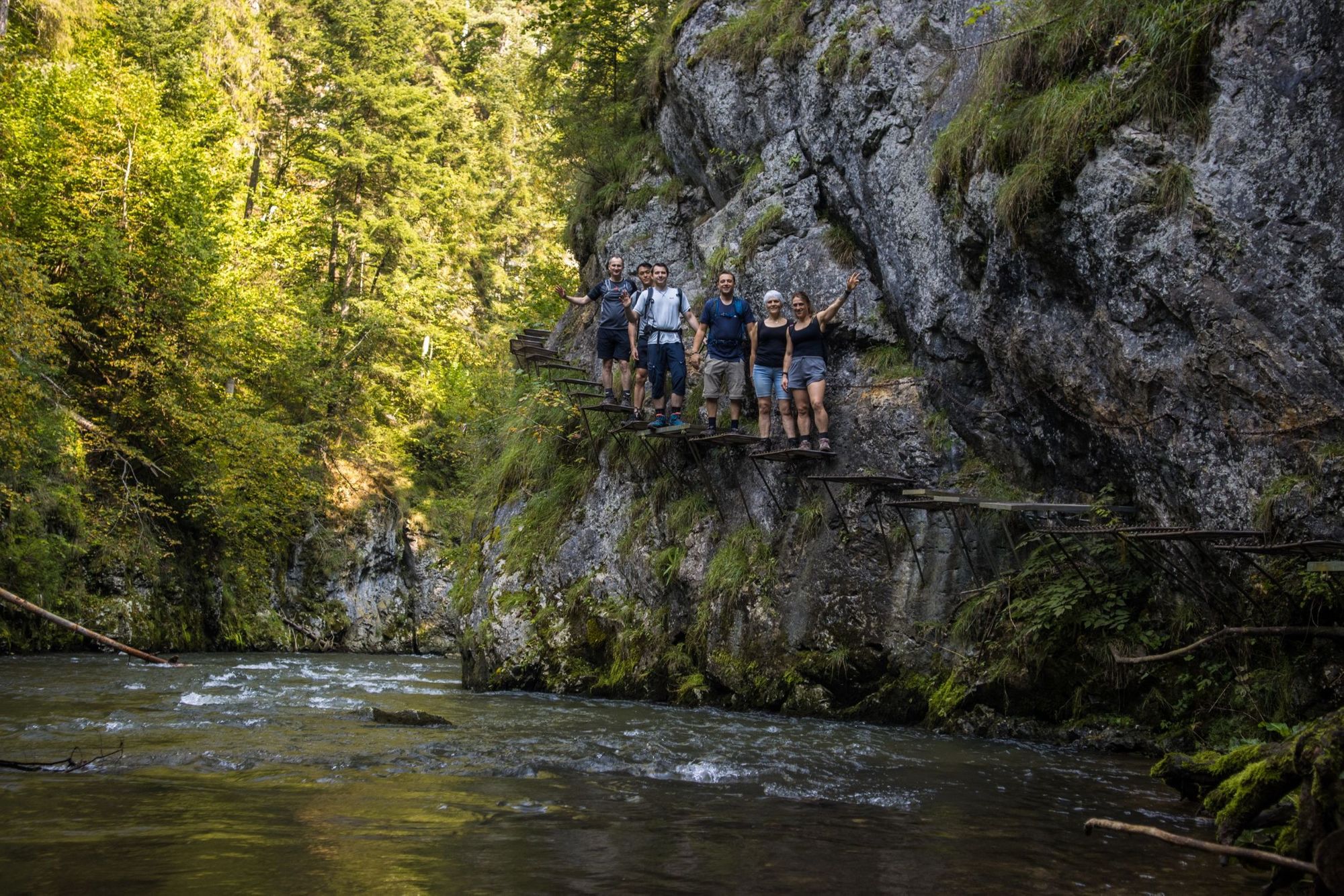 A group of hikers on the built-in boardwalks of Slovakia