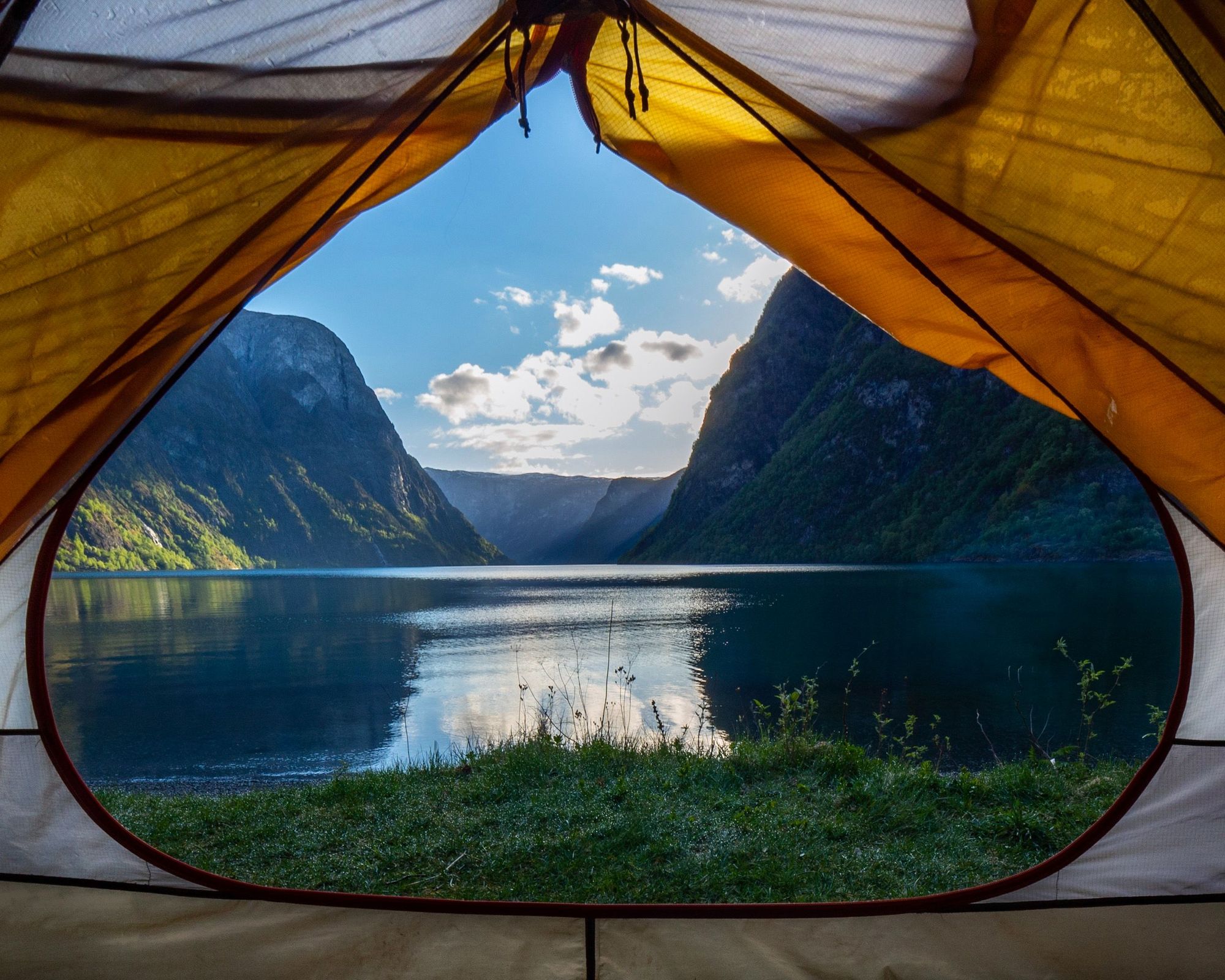 The Norwegian fjords, seen through a tent entrance