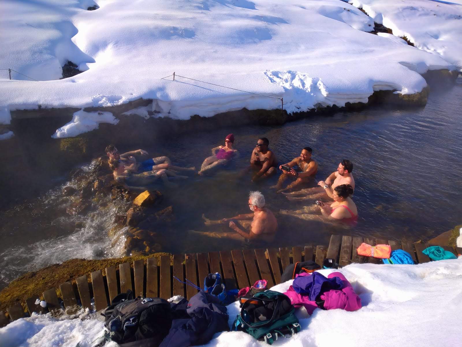 Bathing in a geothermal natural pool in Iceland. Photo: Emilia Blondel/Icelandic Mountain Guides