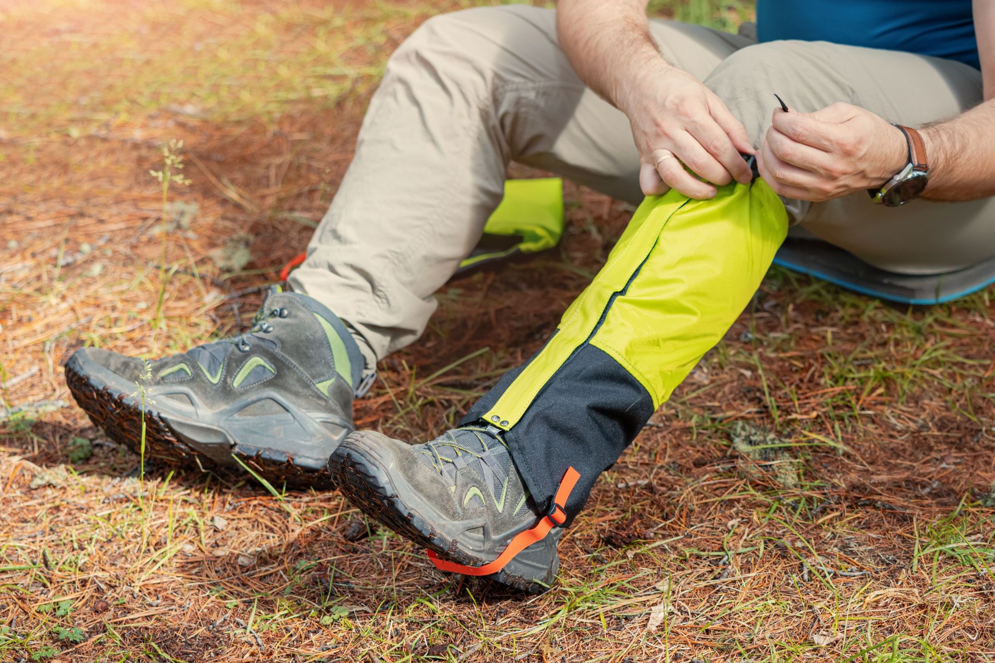 Strapping on gaiters can be a good way to help prevent getting tick bites, providing an extra layer of protection. Photo: Getty
