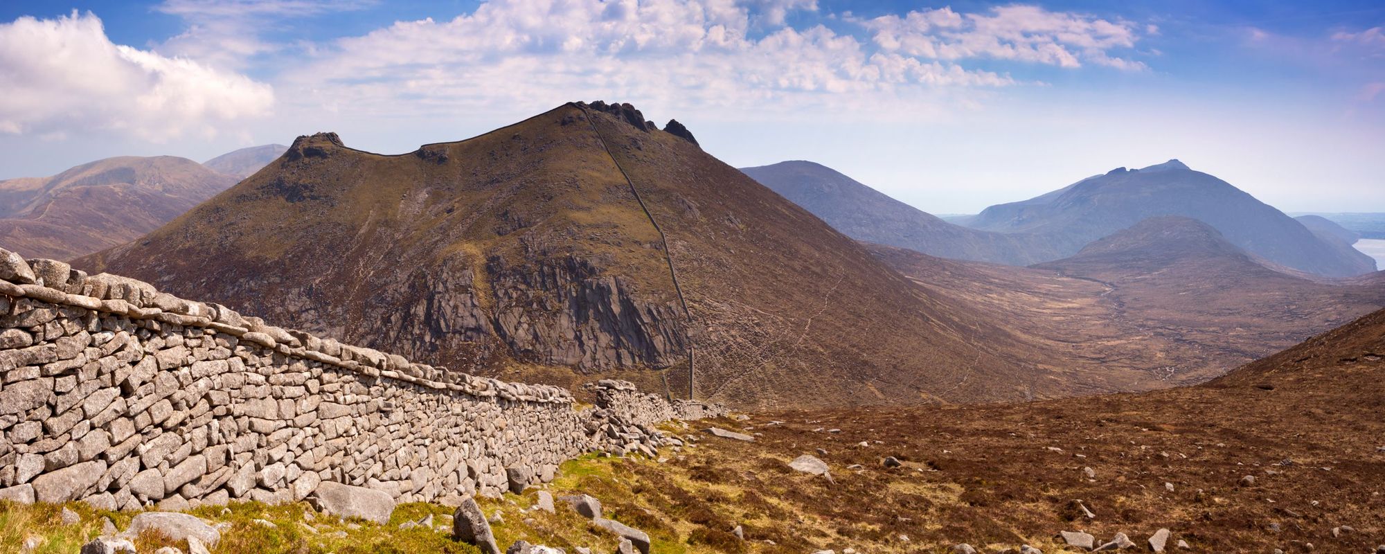 The Mourne Wall, which stretches up the major peaks in the Mourne Mountains, Northern Ireland.