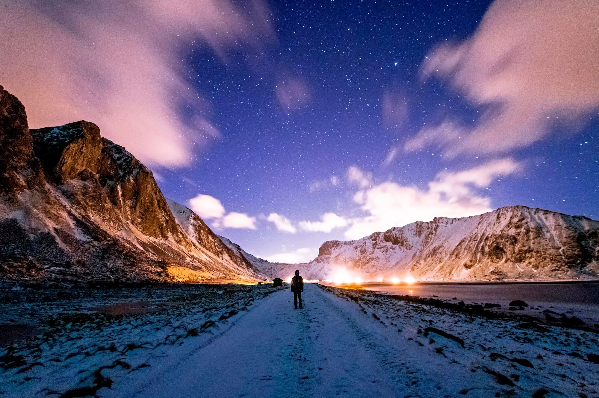 Walking on Unstad Beach, in Lofoten, at night.