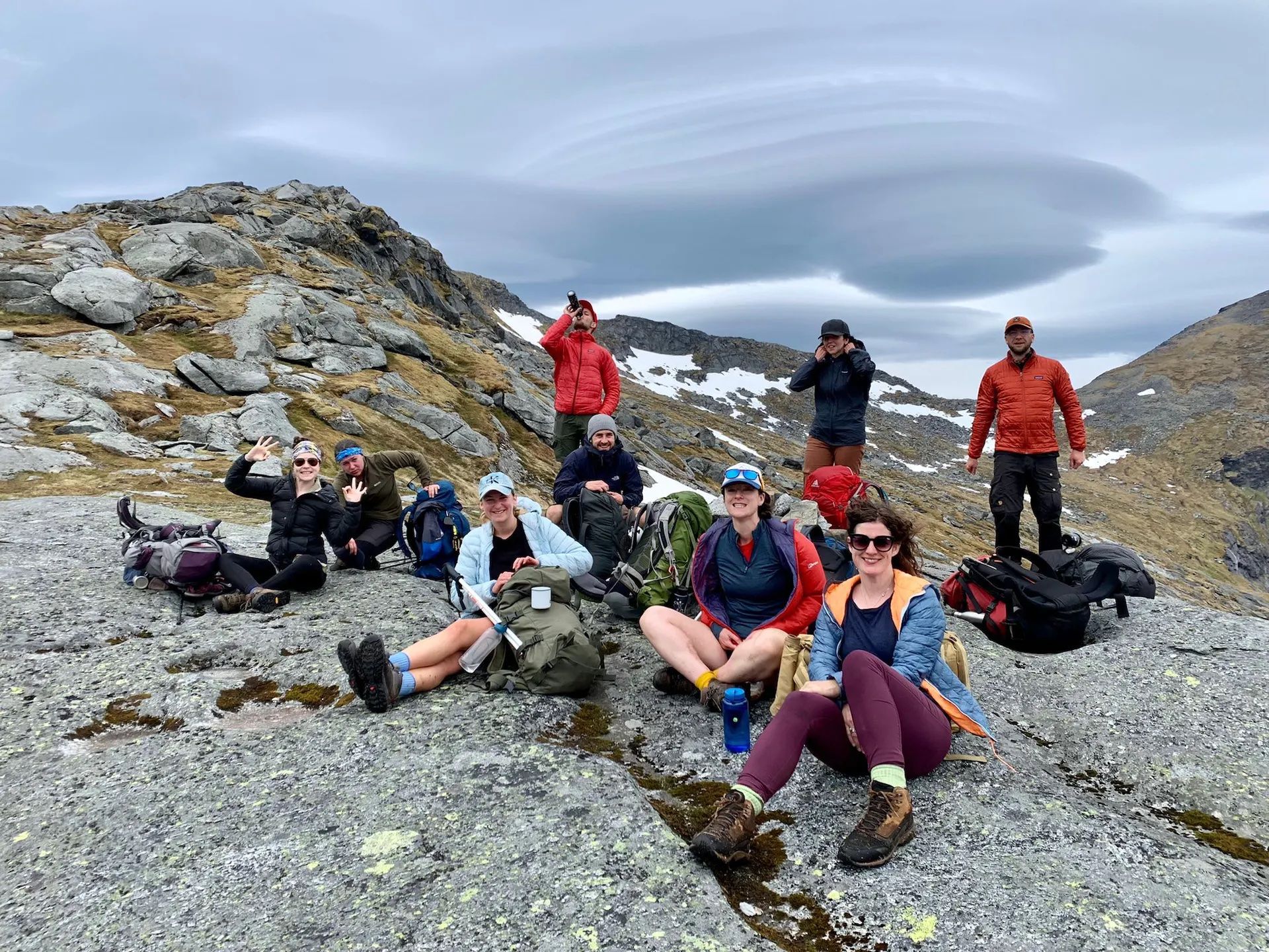 Hikers pose on the summit of Nonstinden in Lofoten. Photo: Northern Explorer.