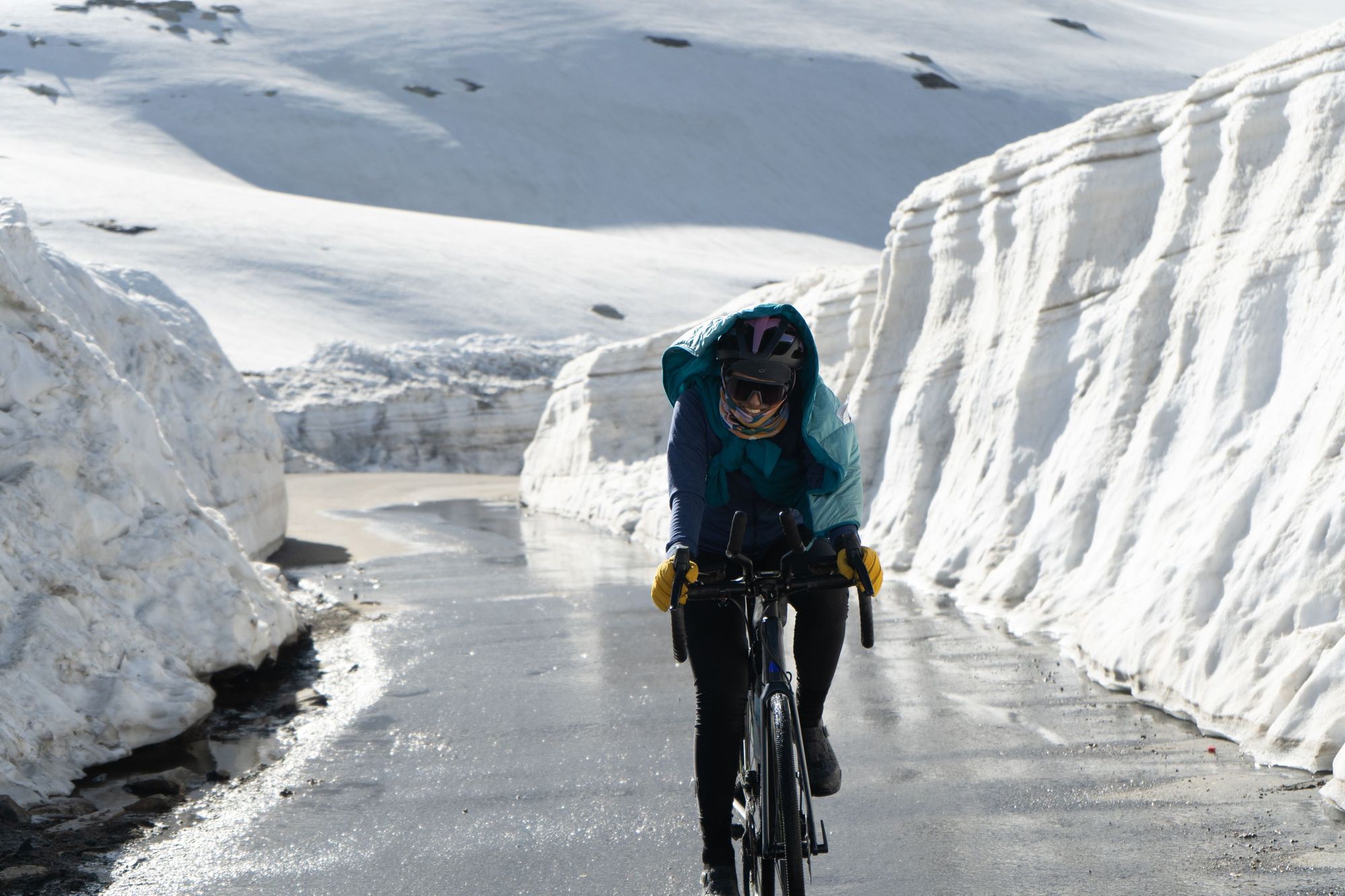 Vedangi Kulkarni cycling between two glaciers. Photo: Vedangi Kulkarni