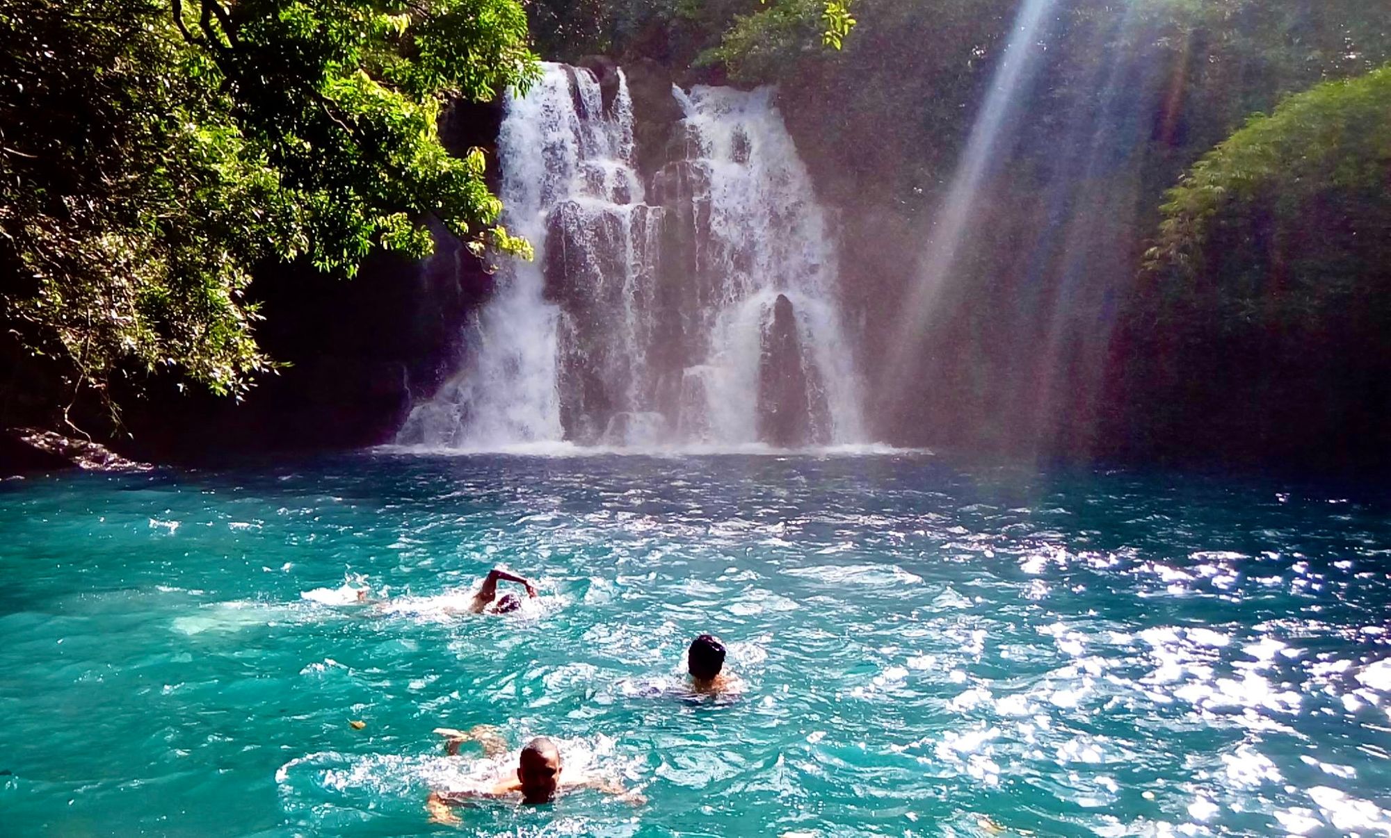 Wild swimming in a waterfall pool in Mauritius. Photo: Mauritius Conscious