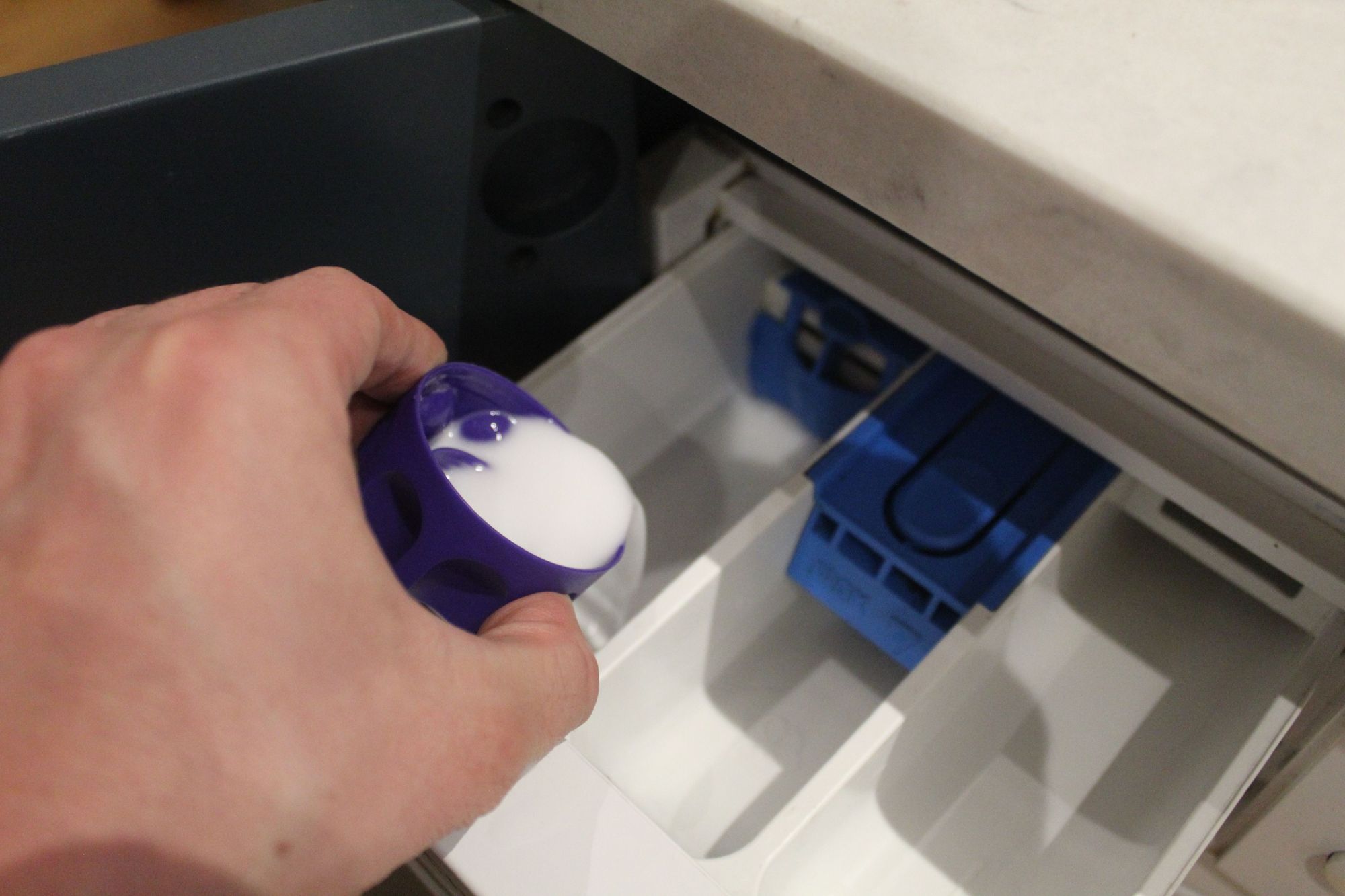 The first image I've ever taken of myself pouring liquid into the detergent drawer of my washing machine. Artsy, right? What a life. Photo: Stuart Kenny