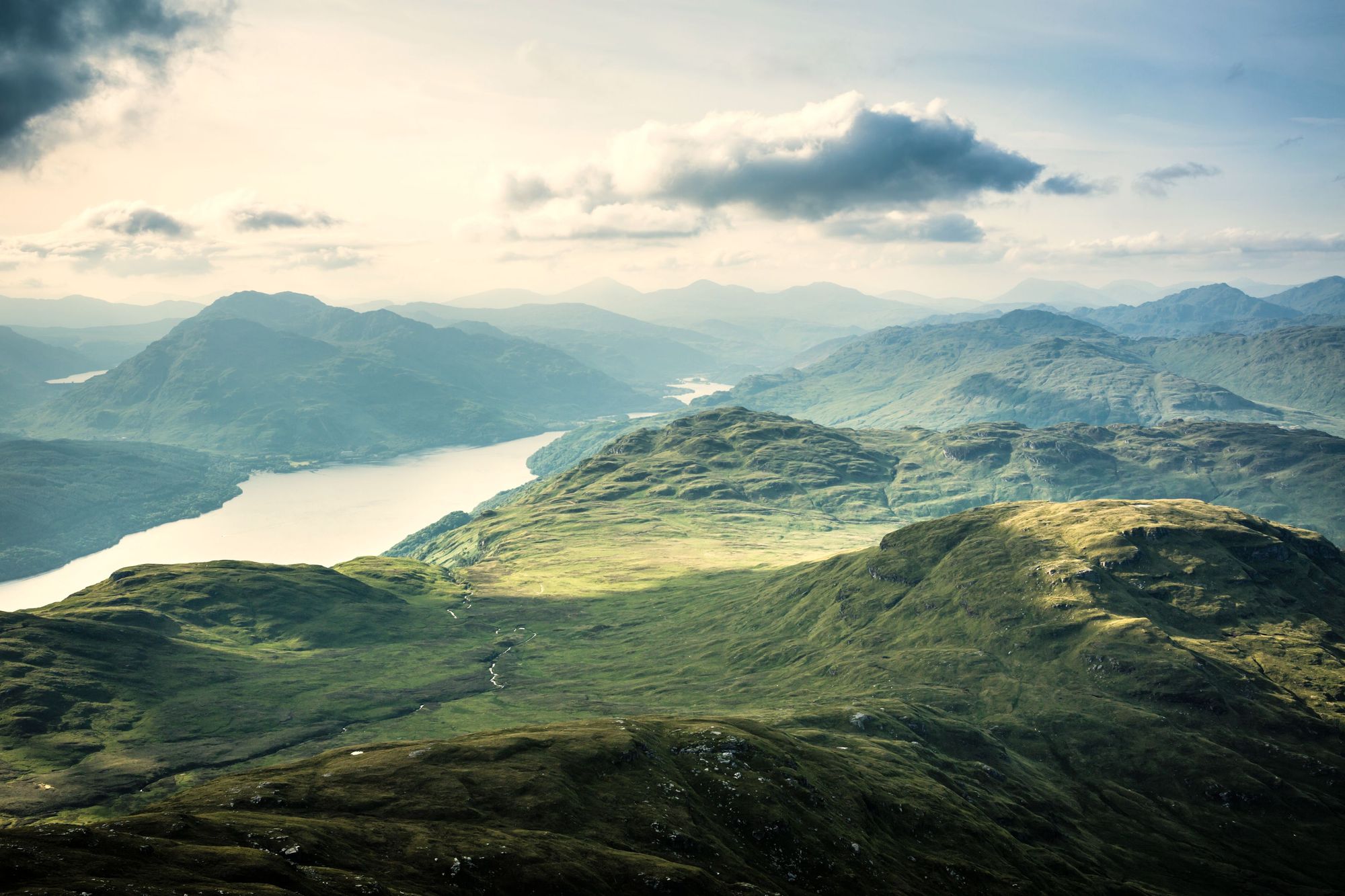 A summer view over the mountains north up Loch Lomond from Ben Lomond. Photo: Getty