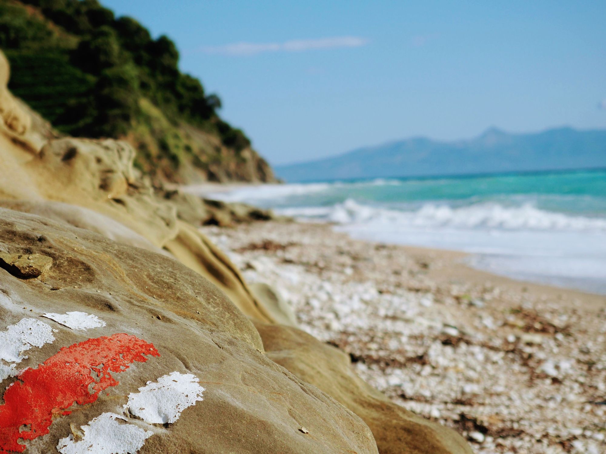 Follow the red stripes: a trail through the forests, beaches and hills of coastal Albania. Photo: Ricardo Fahrig