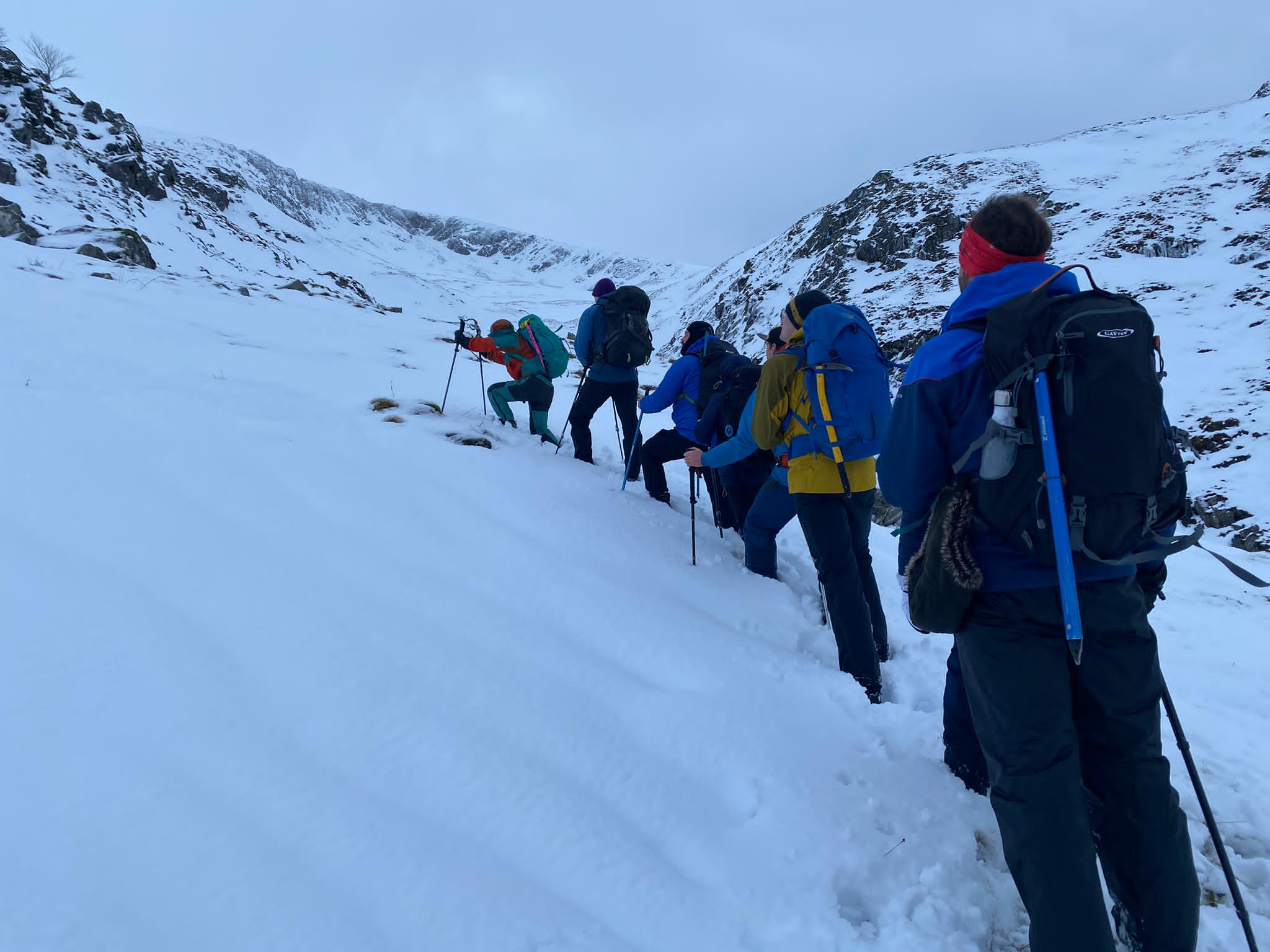 Climbers summiting Ben Nevis in the winter months