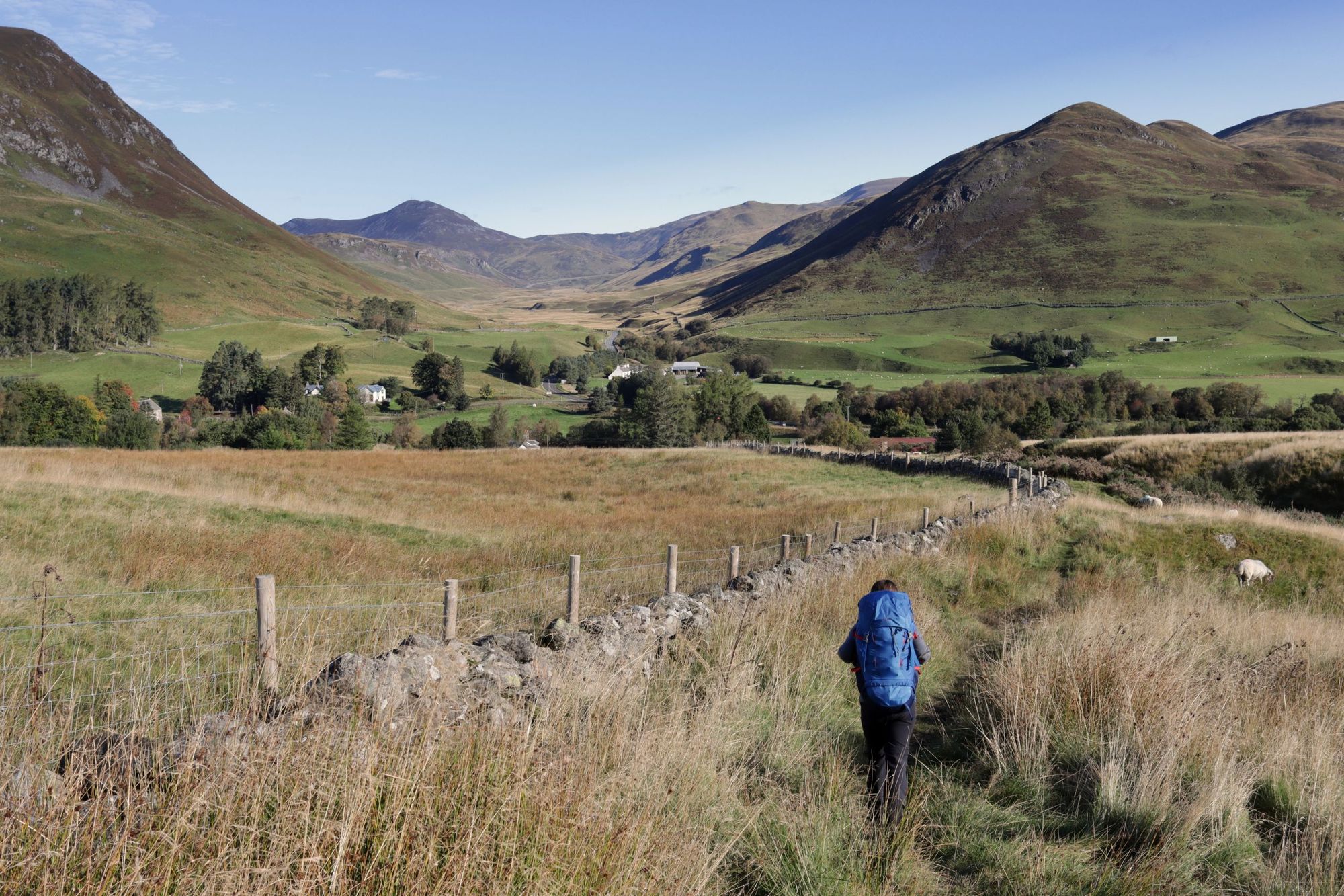 A hiker weaves down a scenic trail near the Spittal of Glenshee, following the Cateran Trail. Photo: Getty