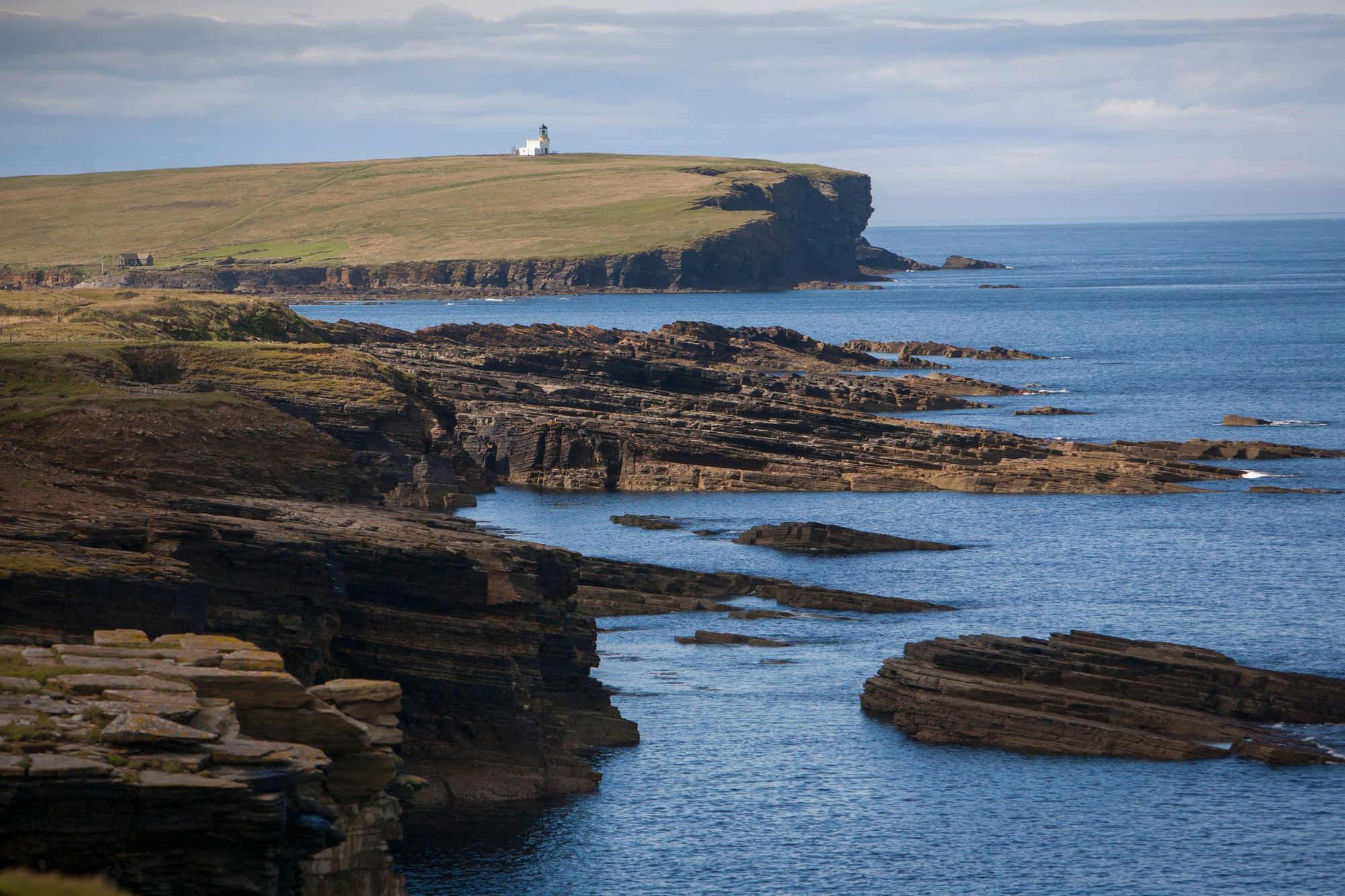 The view of a lighthouse on the Brough of Birsay, an island just of the Orkney mainland. Photo: Getty