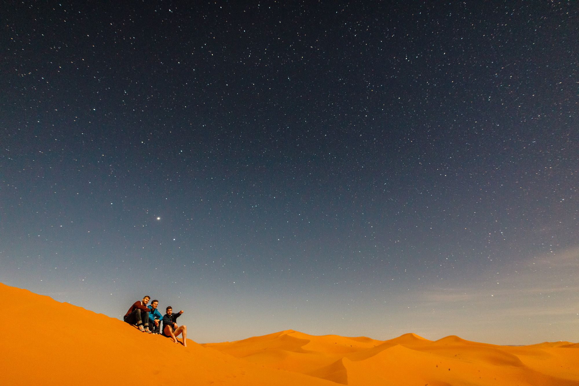 Stargazing in the Moroccan Sahara. Photo: Getty.