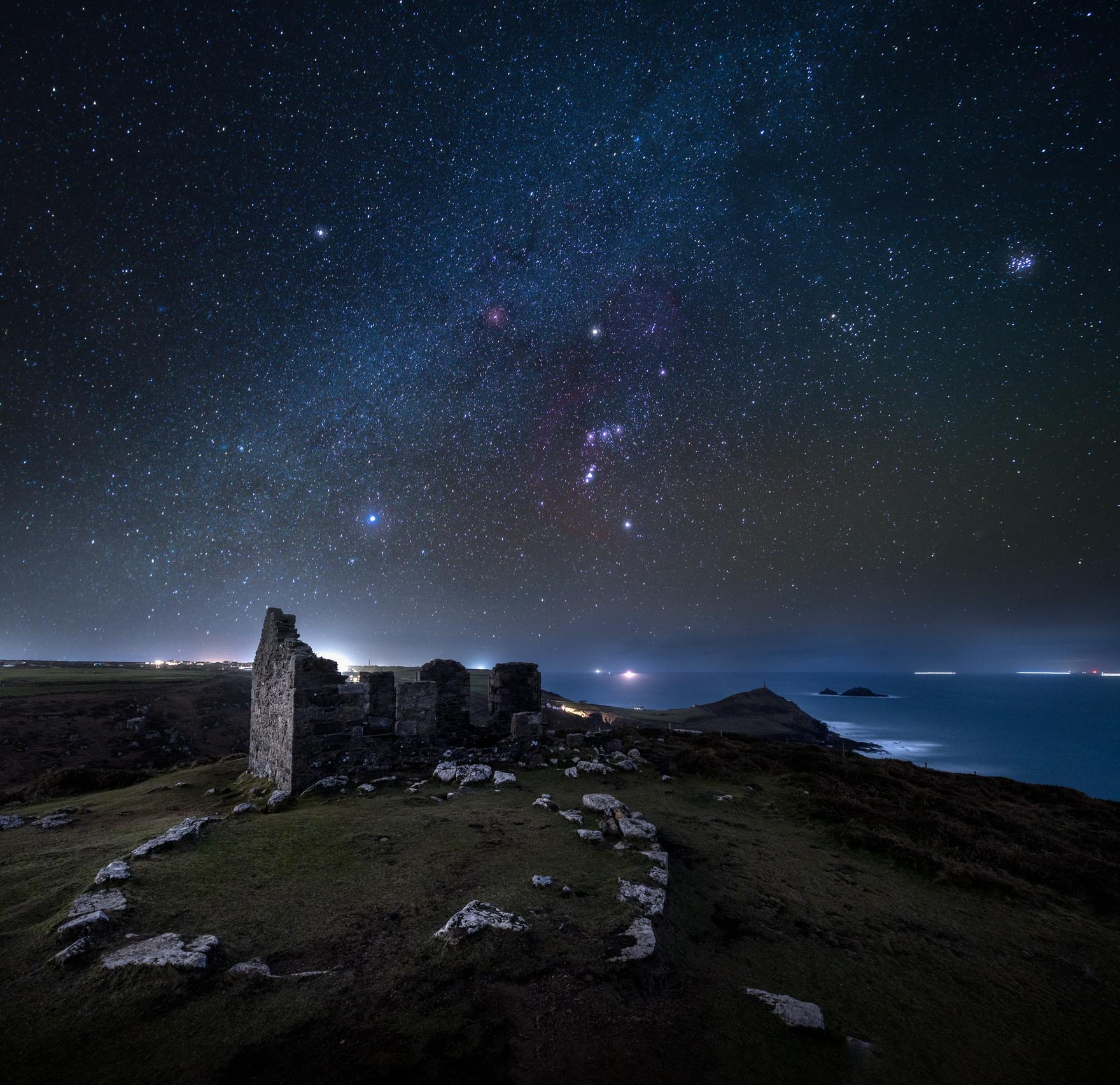A starry night sky above a Bronze Age cairn in Cornwall. Photo: Getty.