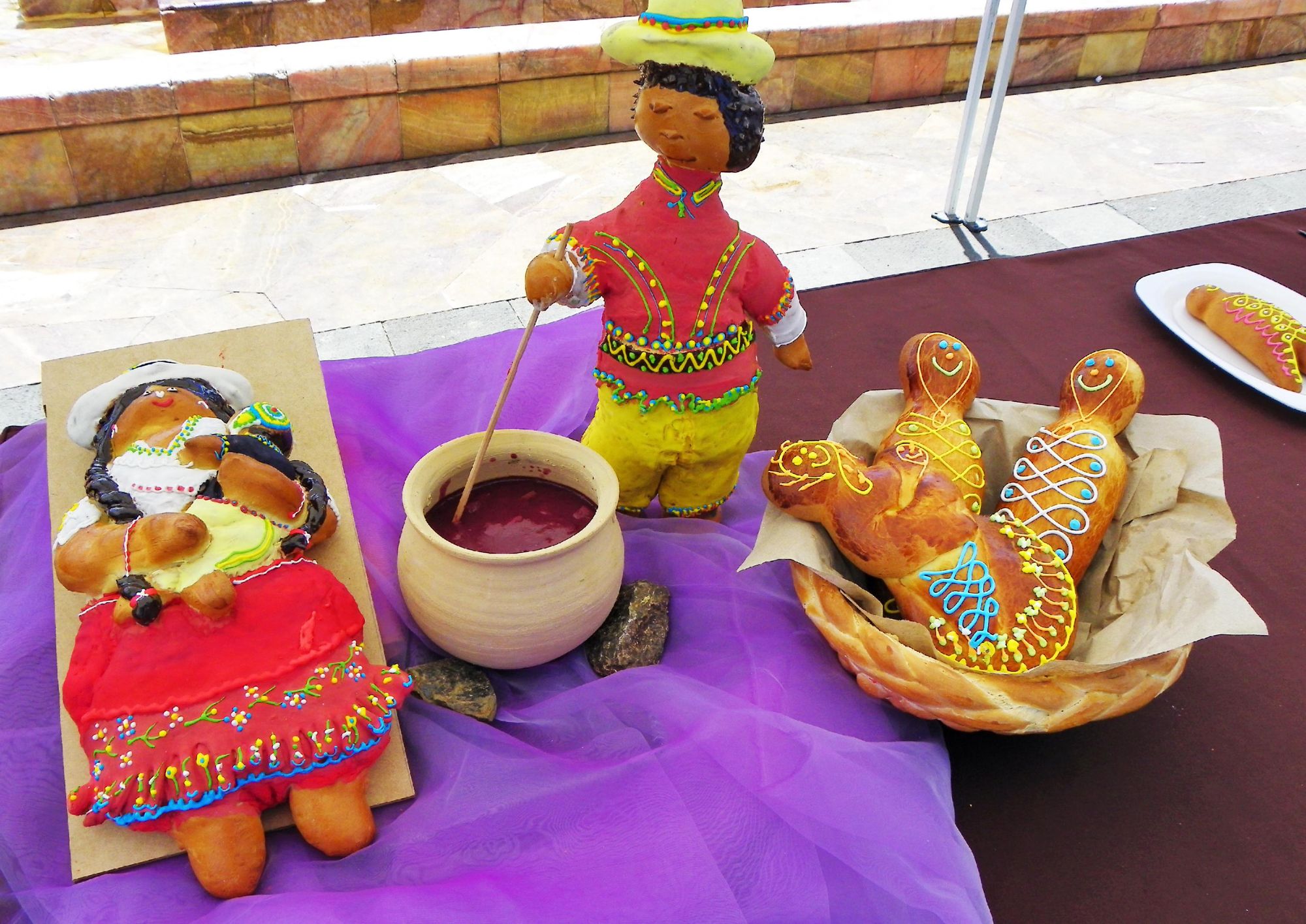 A display of guaguas de pan and colada morada for Dia de los Difuntos in Ecuador. Photo: Getty.