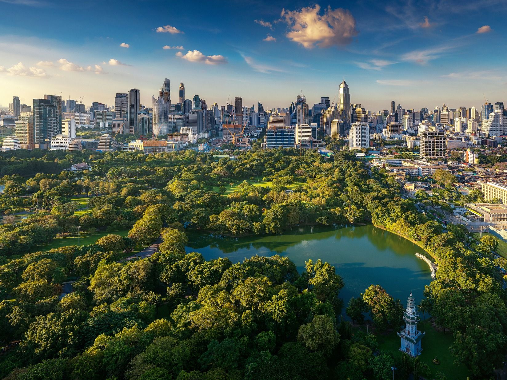 The skyscrapers and parks of Bangkok, the capital of Thailand.