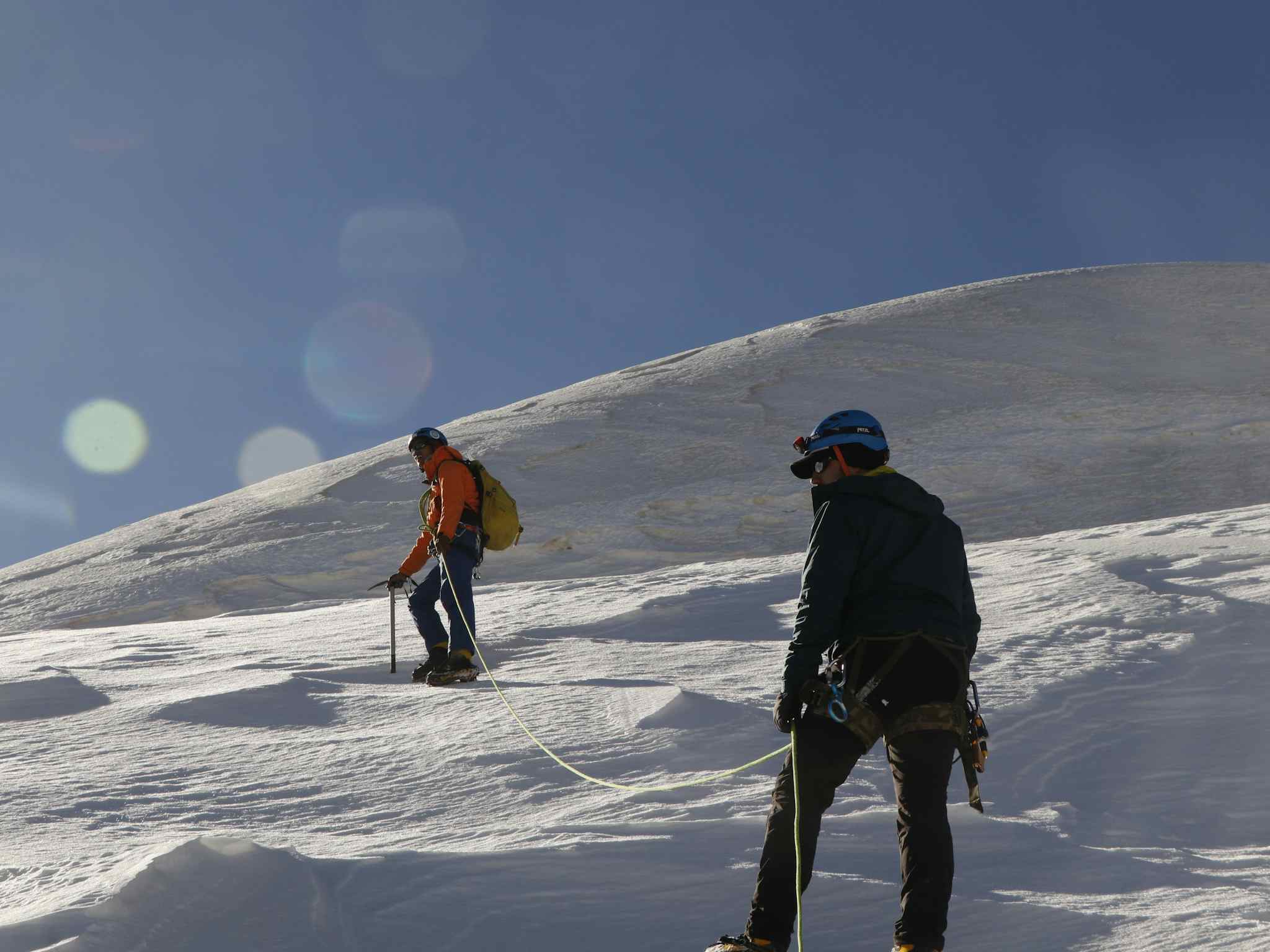 Two hikers testing out mountaineering gear in Nepal.