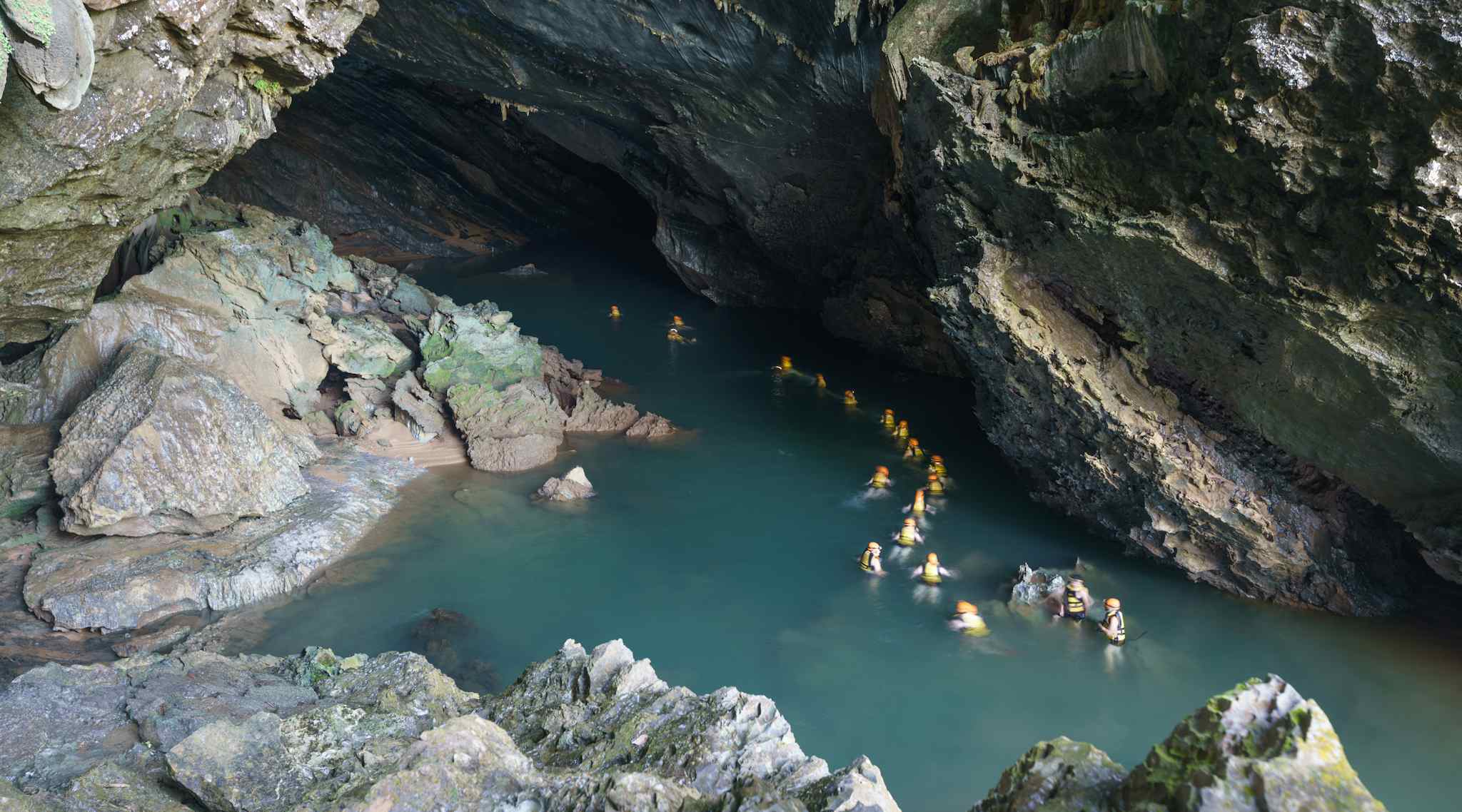 Swimming through Tra Ang Cave, Vietnam. Photo: Easia Active.