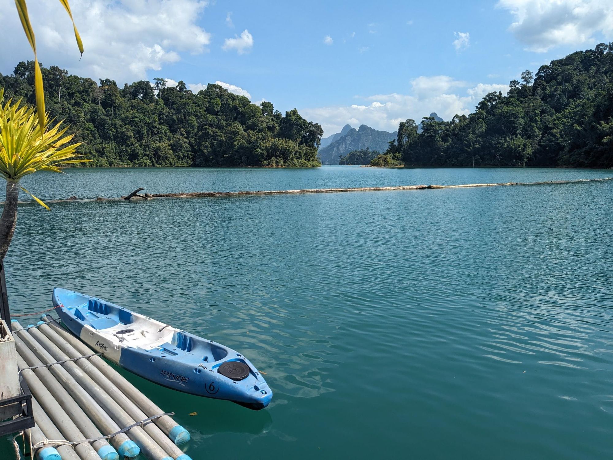 Floating bungalow decking with a kayak in Cheow Lan, Thailand.