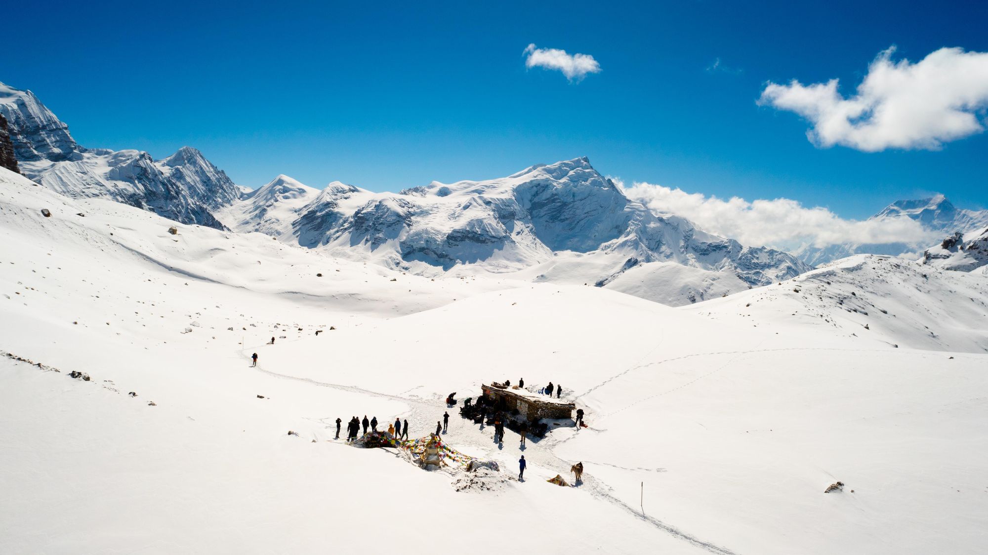 An aerial shot of the Thorong-La Pass, surrounded by snow. Photo: Josh Edwards