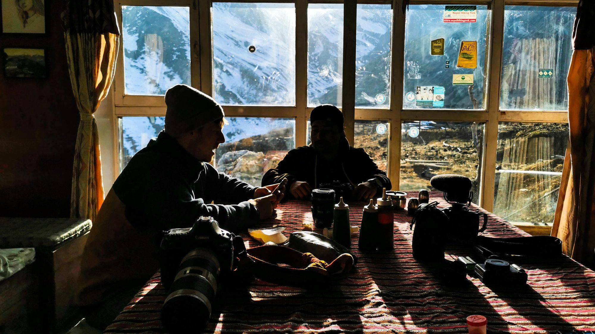 The author and his team resting up after a big day of hiking in the mountains. Photo: Josh Edwards