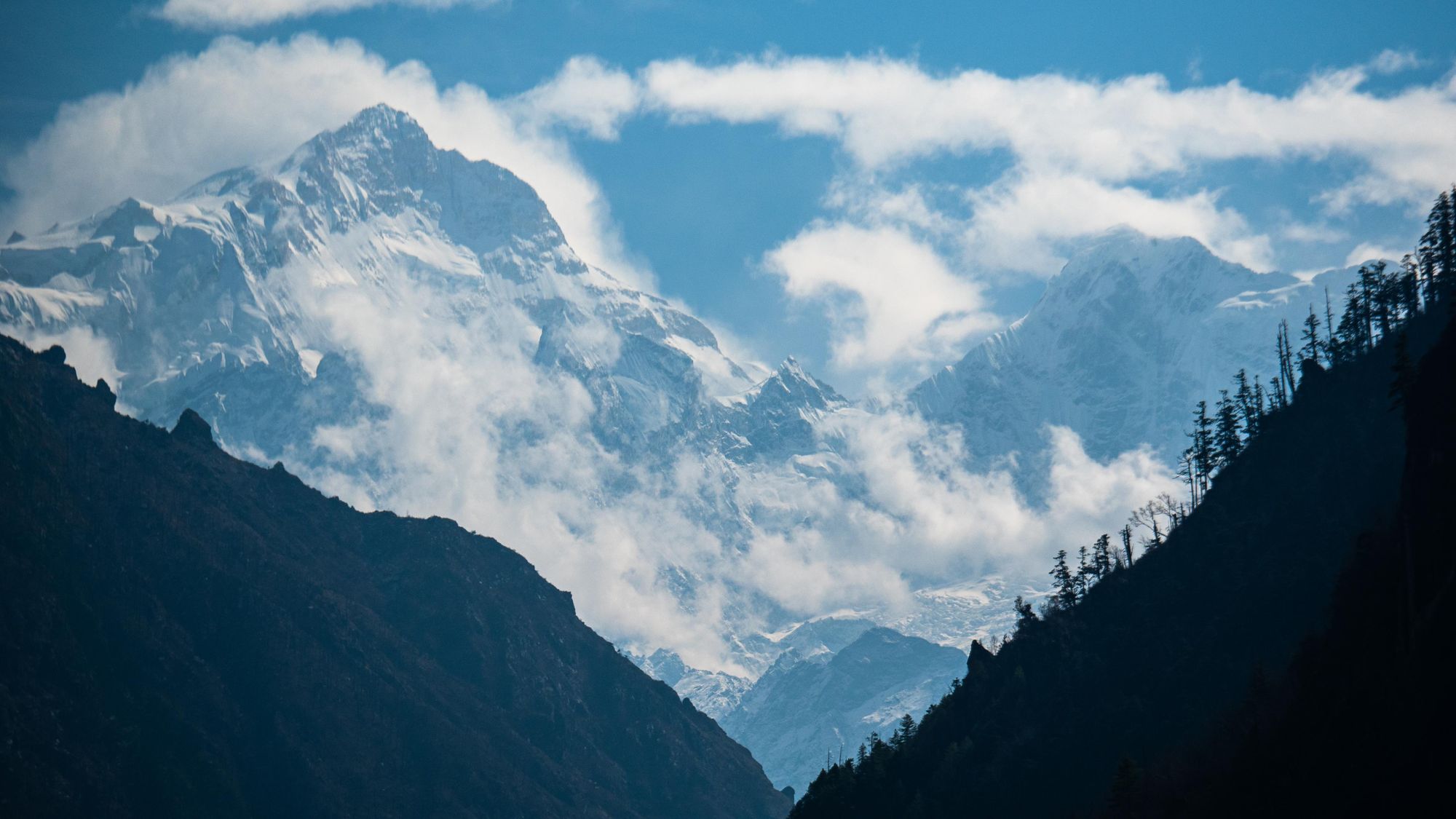 The towering Himalayan mountains which layer into the distance. Photo: Josh Edwards
