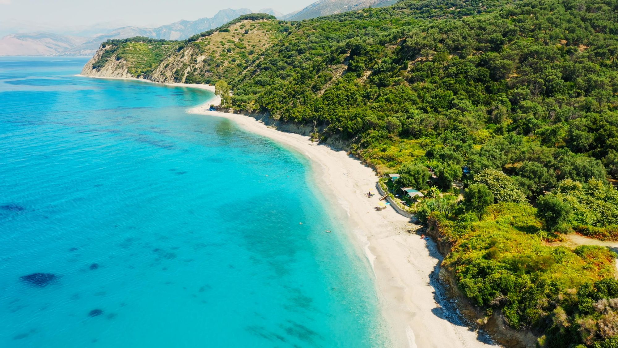 The lush greenery and perfect waters of the Albanian coast. Photo: Getty