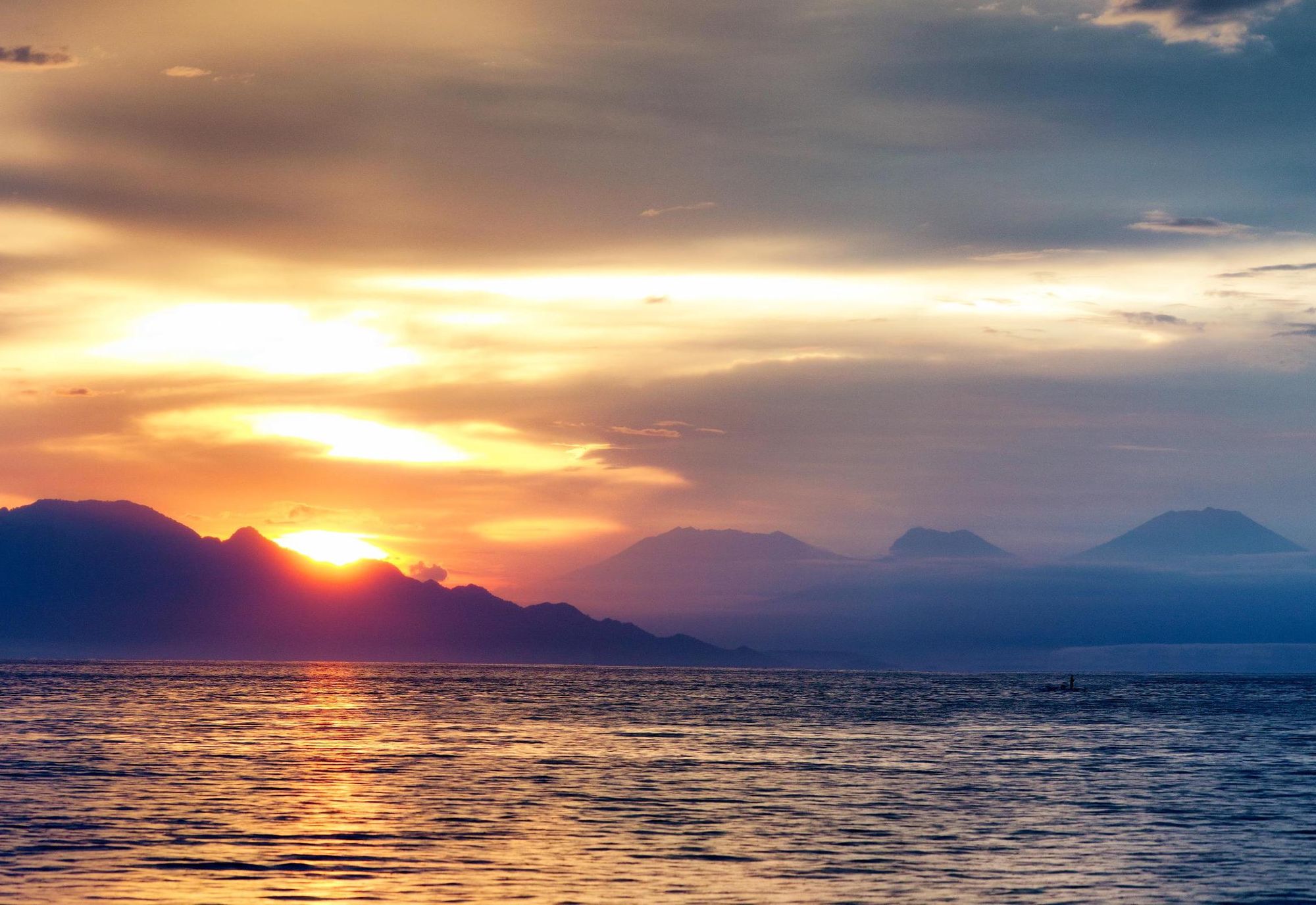The sunset, viewed from the north coast of Bali. Photo: Getty