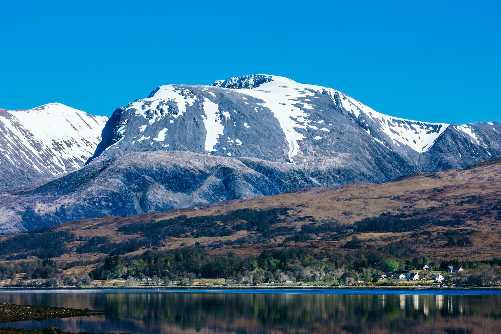The mighty Ben Nevis, pictured today, with snow on the summit. Photo: Getty