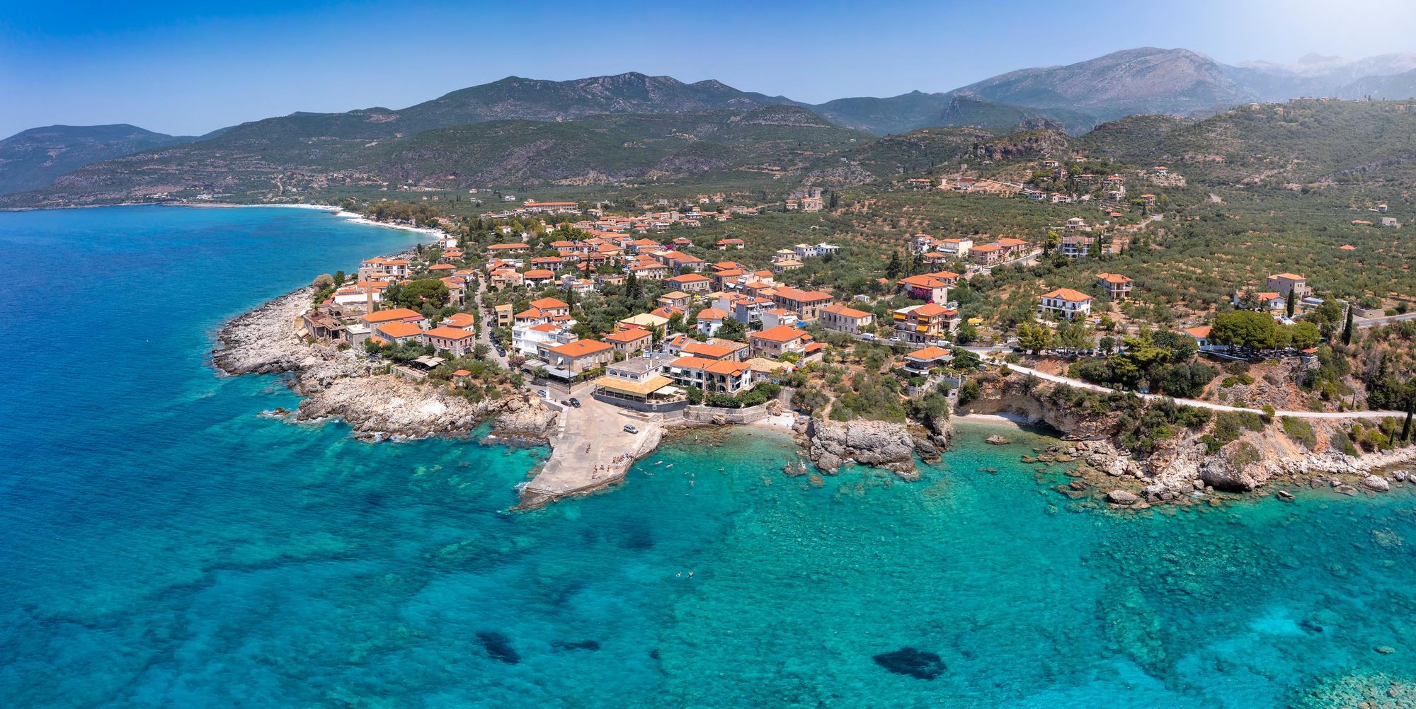 An aerial panoramic view to the idyllic town of Kardamili, the starting point of the hike. Photo: Getty