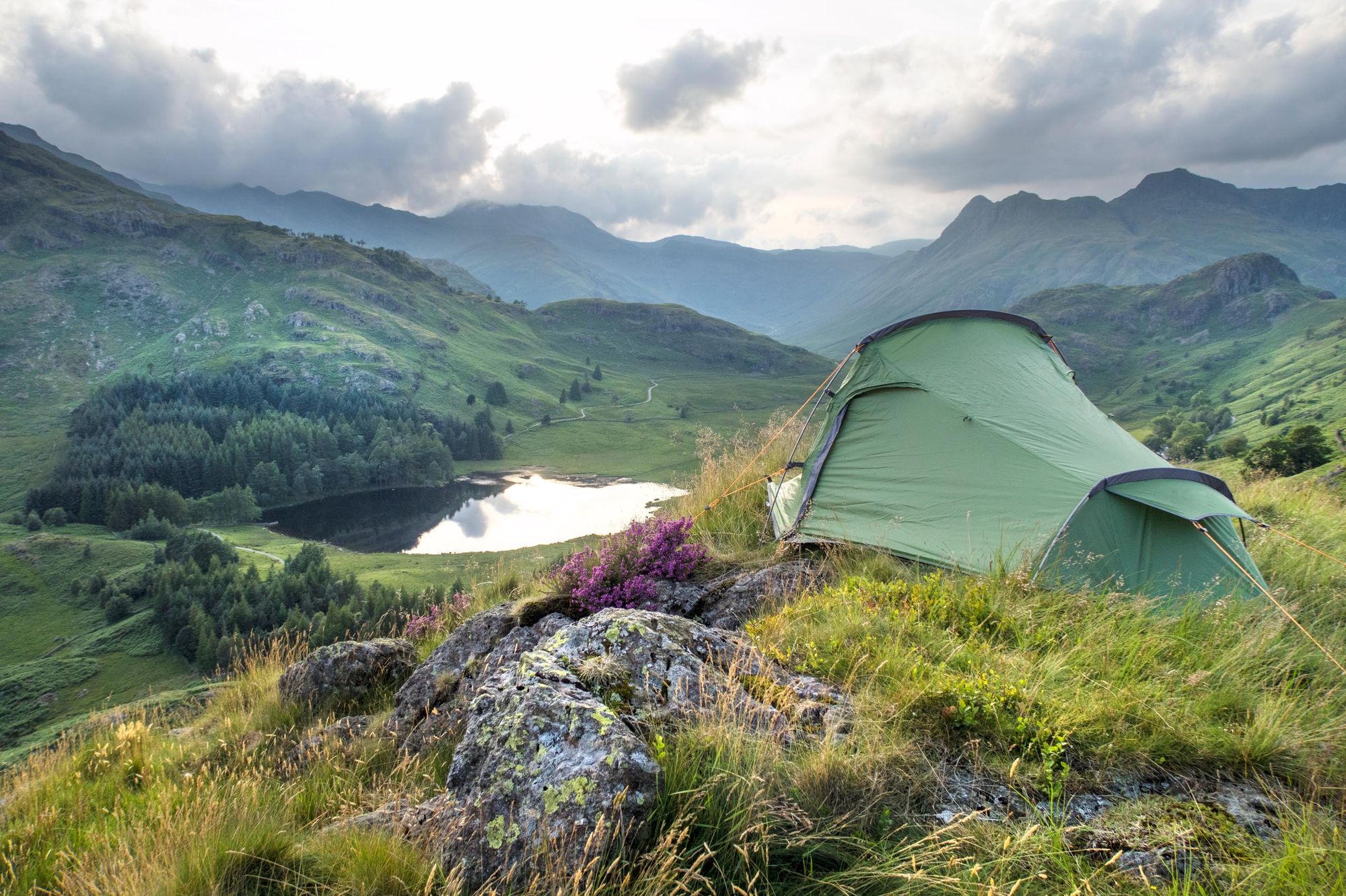 A wild camping pitch in Scotland looking out over lochs, bens and glens. Photo: Getty