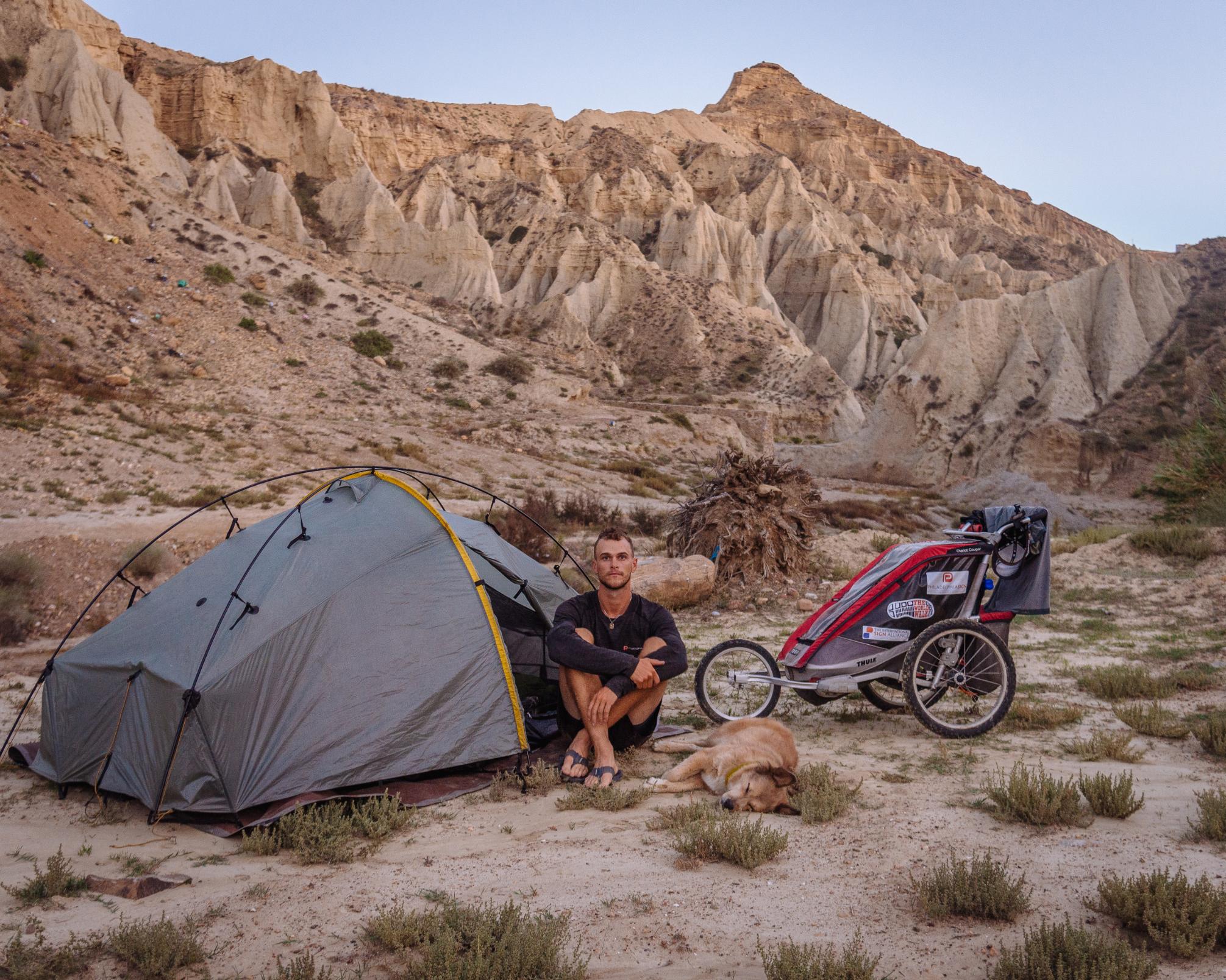 Tom with his dog Savannah, on his round the world walk. Photo: Tom Turcich.