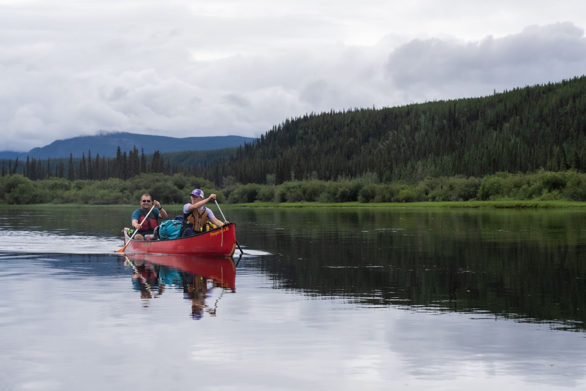Paddling a canoe in the Yukon. Photo: Ruby Range.