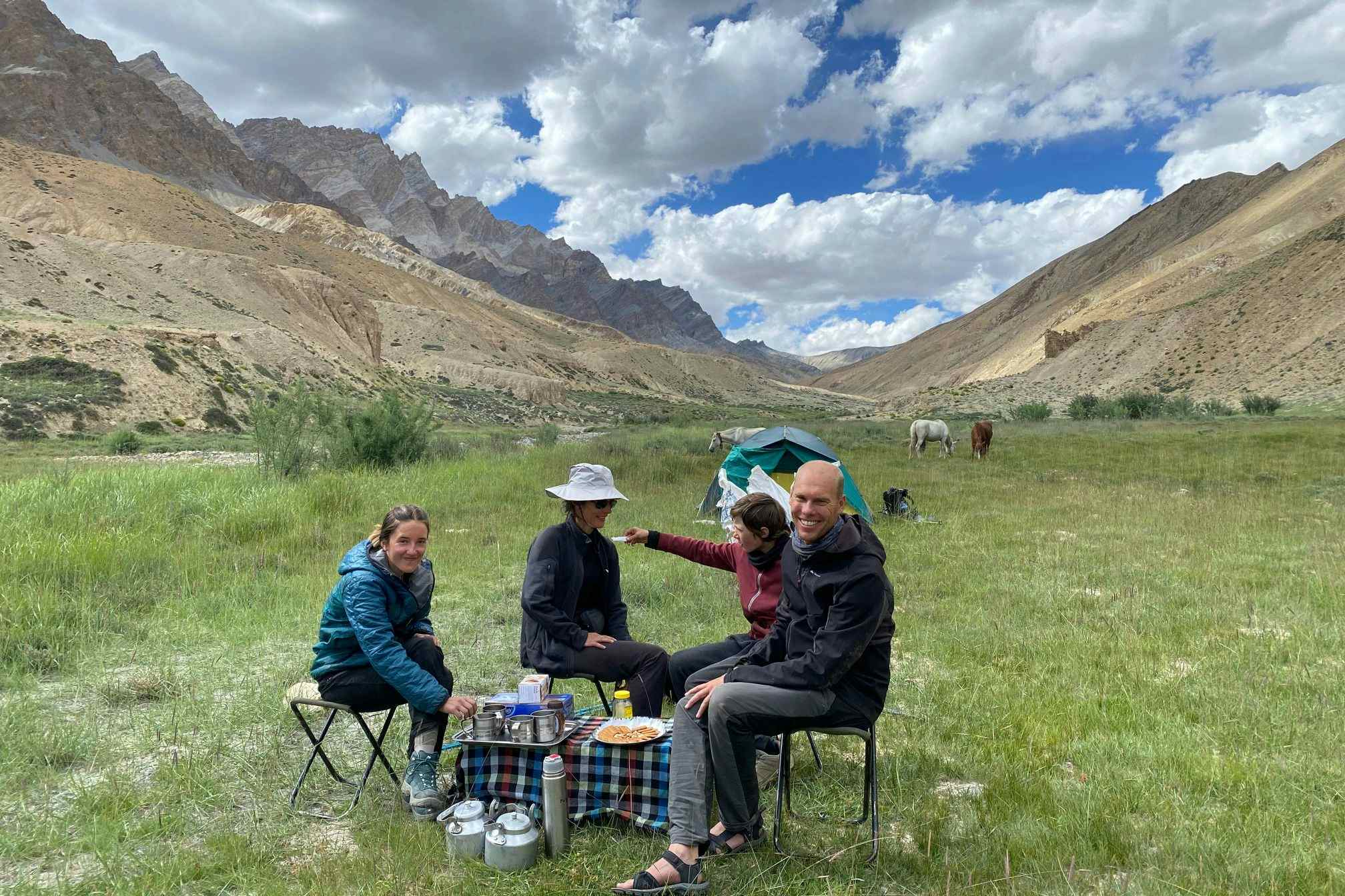 Hikers relaxing at the campsite near Lato, Ladakh, India. Photo: Majestic Ladakh.