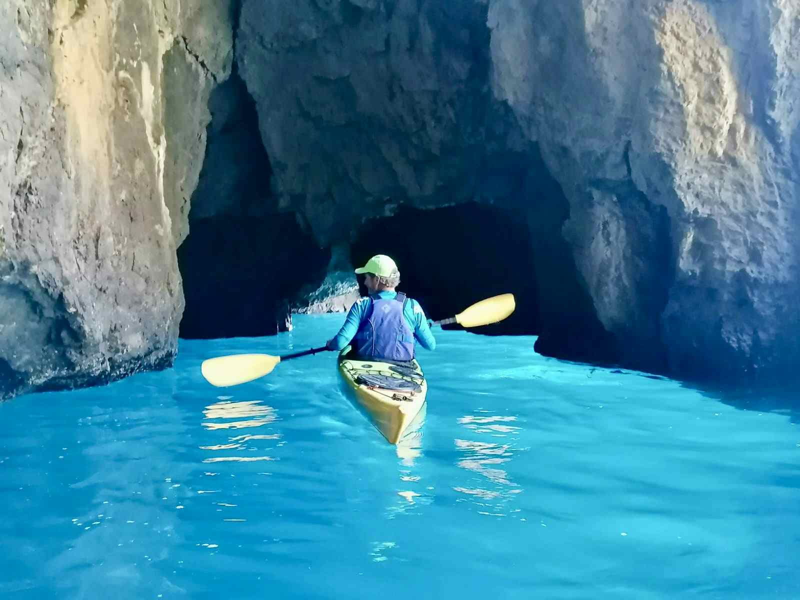 Sea kayaking Grotto Azzurra, Italy.