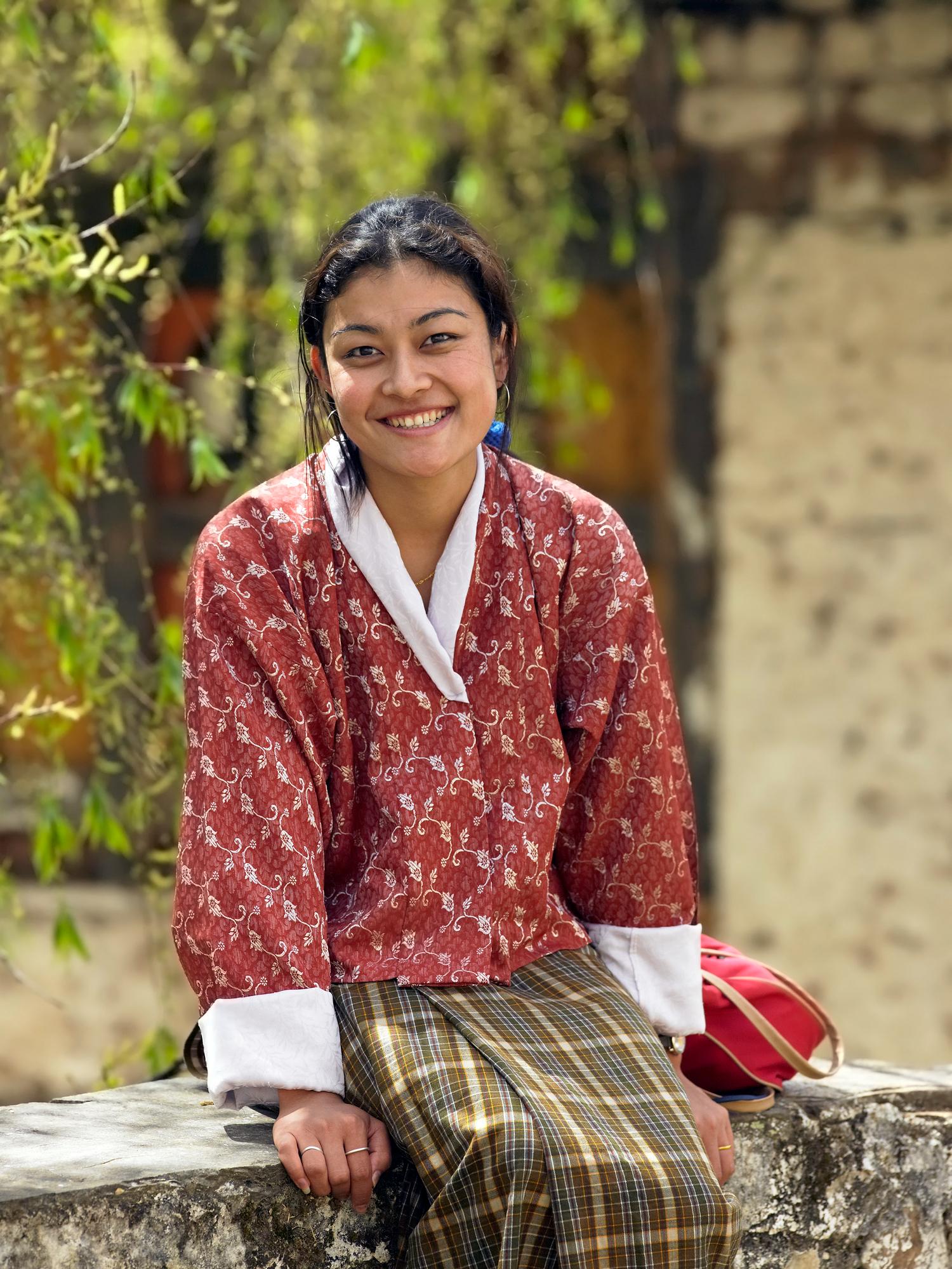 A Bhutanese woman in traditional dress in the town of Paro in the Kingdom of Bhutan. Photo: Getty