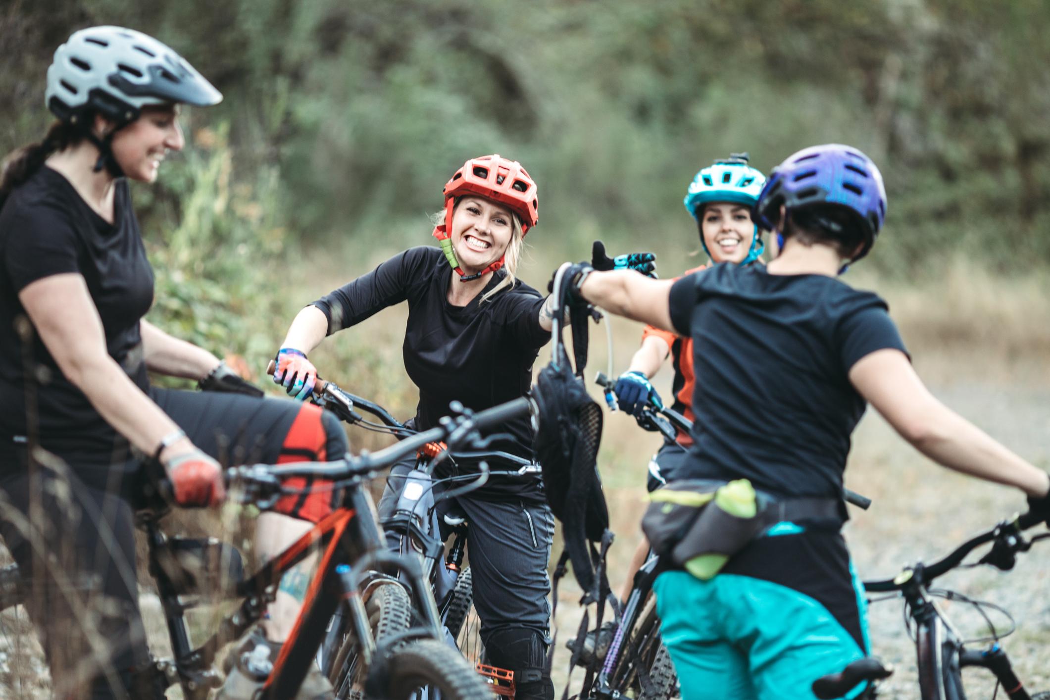 A group of mountain bikers soon to make their way down some trails in a forest. Photo: Getty