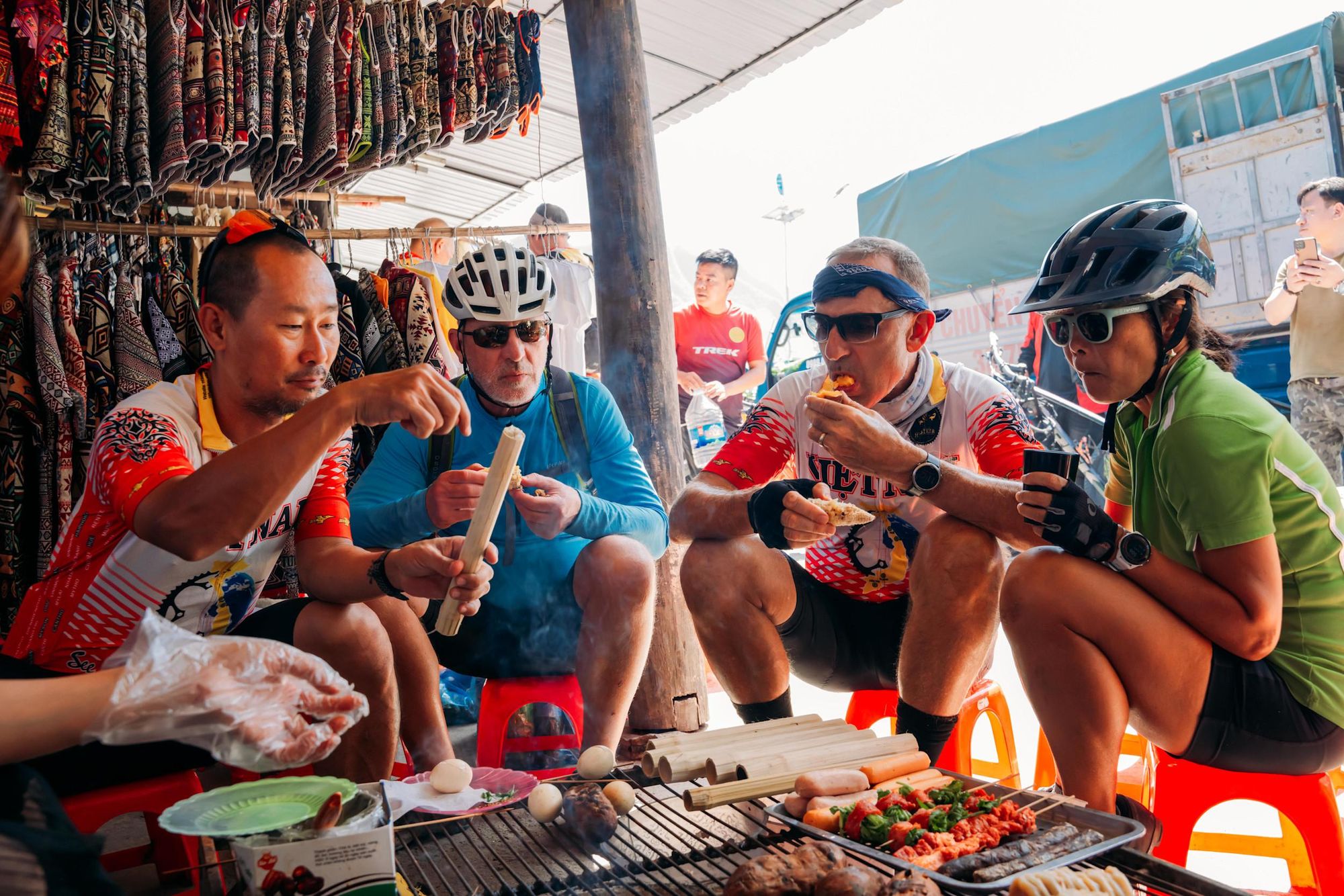 Cyclists stopping for a food break in Vietnam.