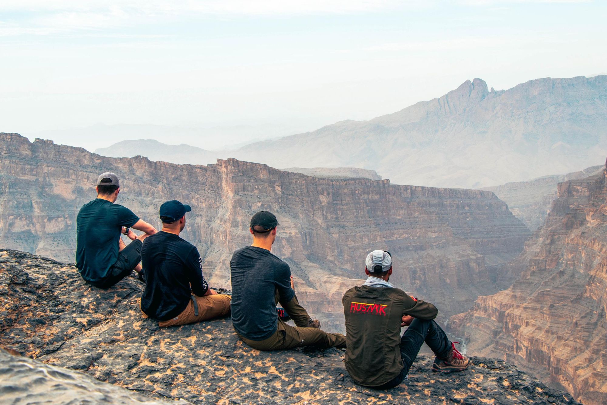 Hikers on the summit of Jebel Shams. Photo: Husaak Adventures.