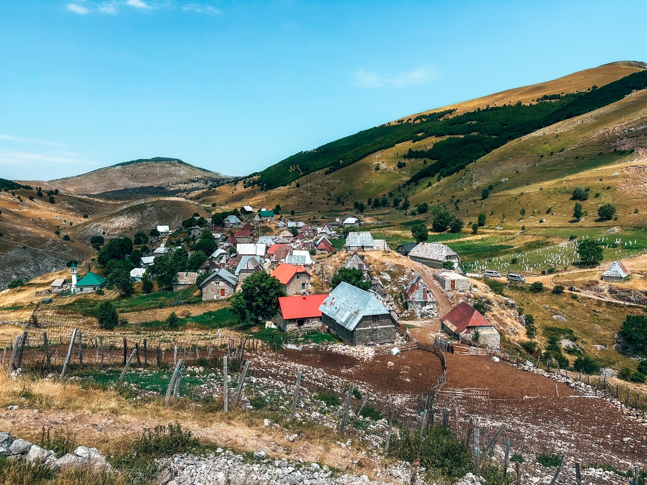 A view over the full town of Lukomir, from a nearby viewpoint. Photo: Absolutely Lucy