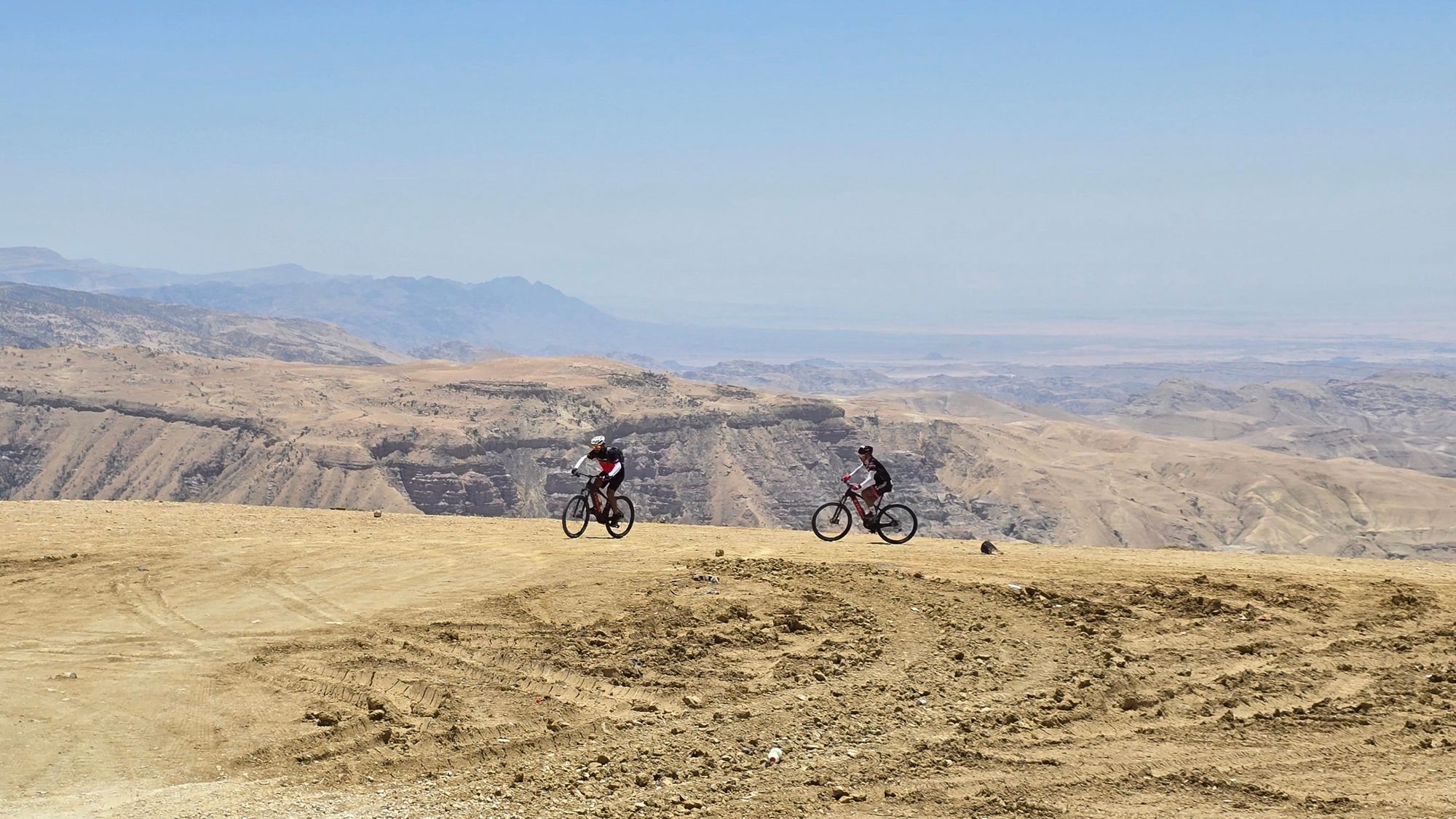 Climbing above the canyons of Jordan. Credit: Experience Jordan Adventures