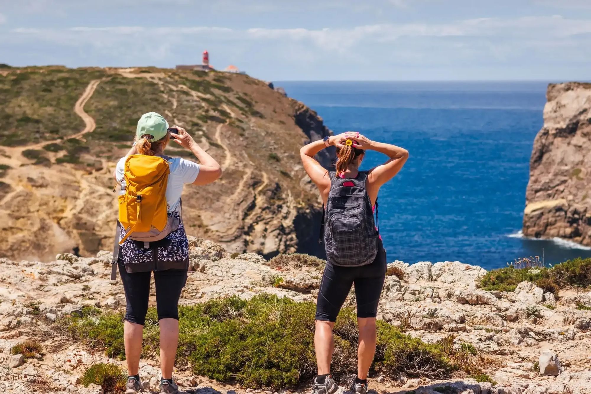 Hikers near Sagres, Portugal. Photo: Getty.