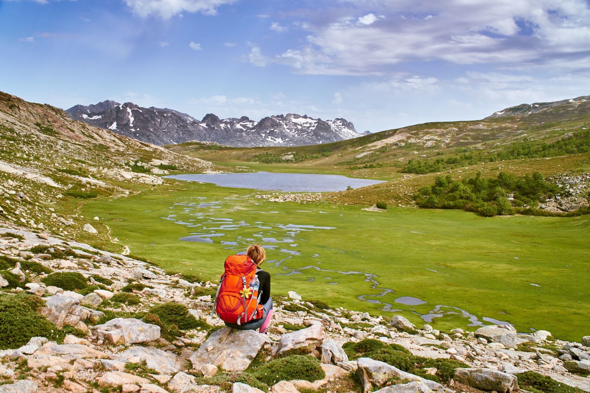 Hiker on the Camputile Plateau, along the GR20 route. Photo: Shutterstock.