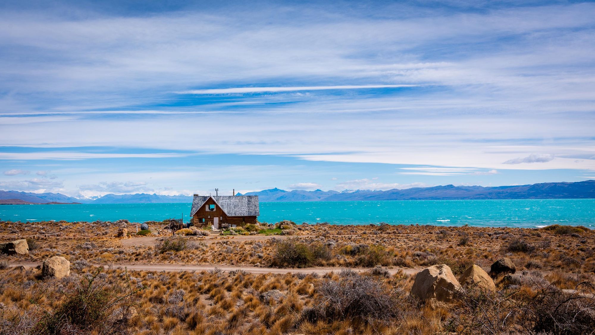 An abandoned house overlooking Lago Argentino in Patagonia. Photo: Getty.