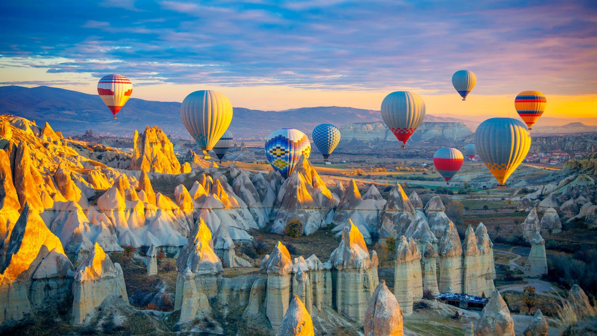 Hot air balloons fly over the fairy chimneys of Cappadocia, in central Turkey. Photo: Getty